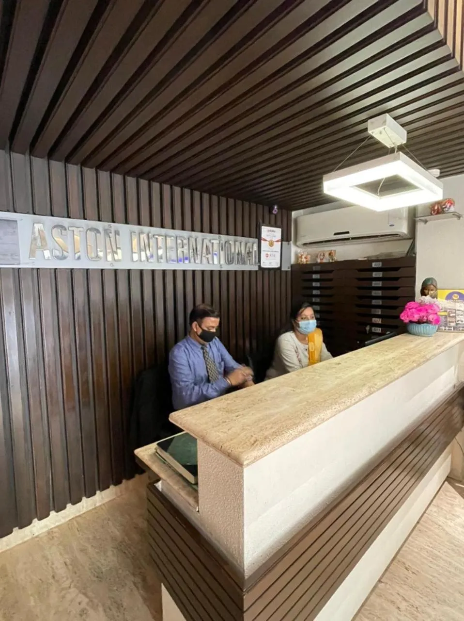 Staff in Hotel Aston International