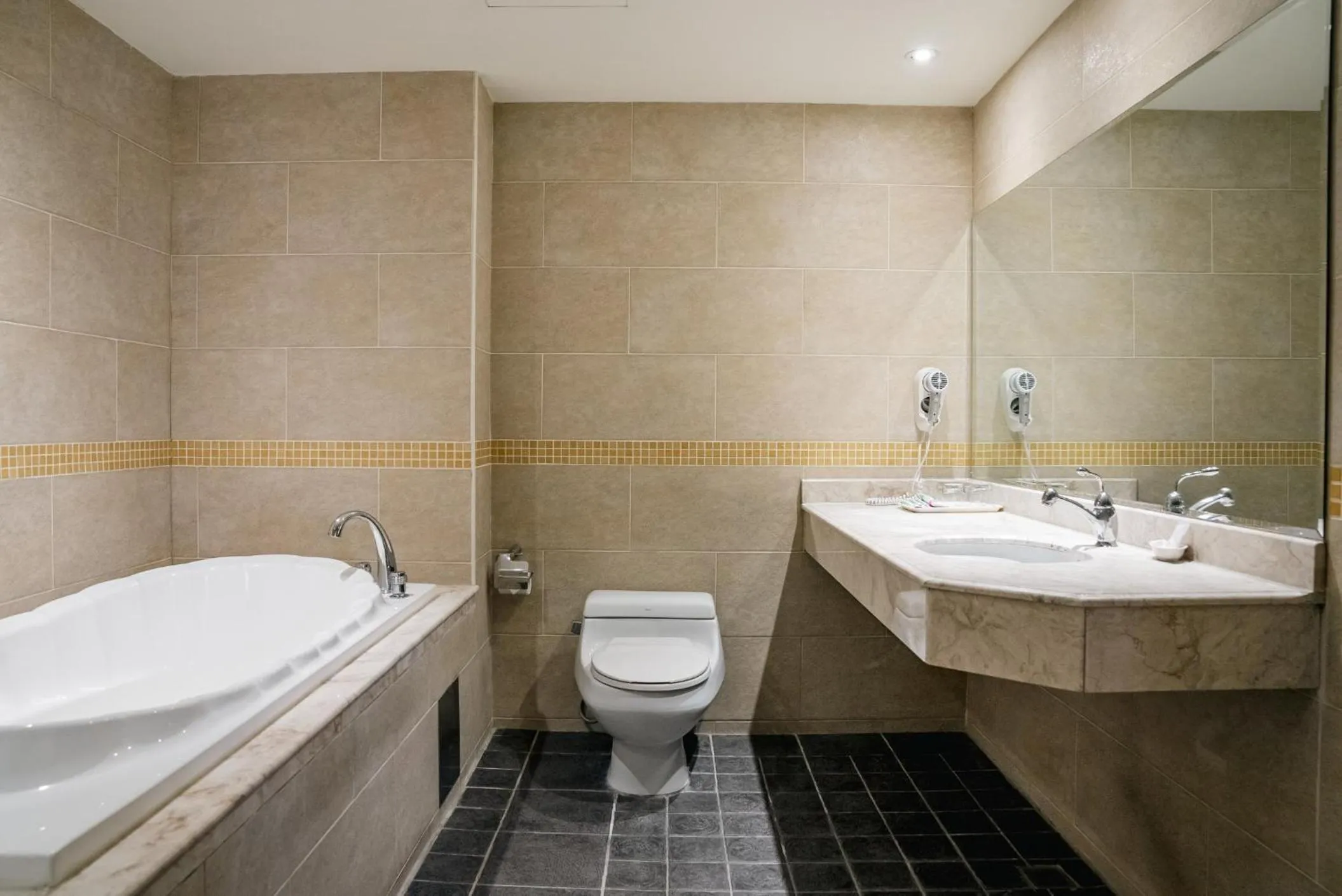 Toilet in East Coast Hotel