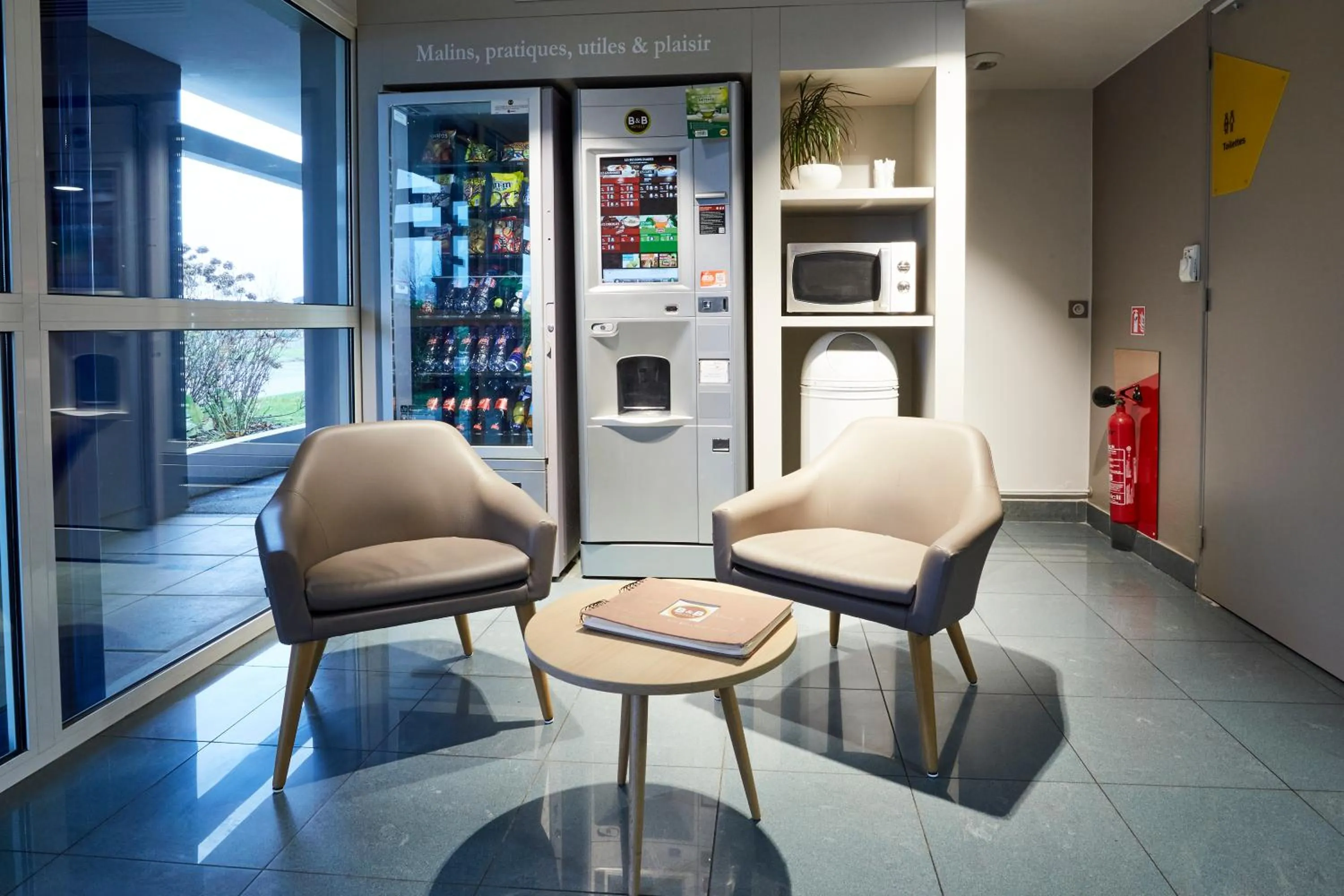 Lobby or reception in B&B HOTEL AVRANCHES Baie du Mont St-Michel