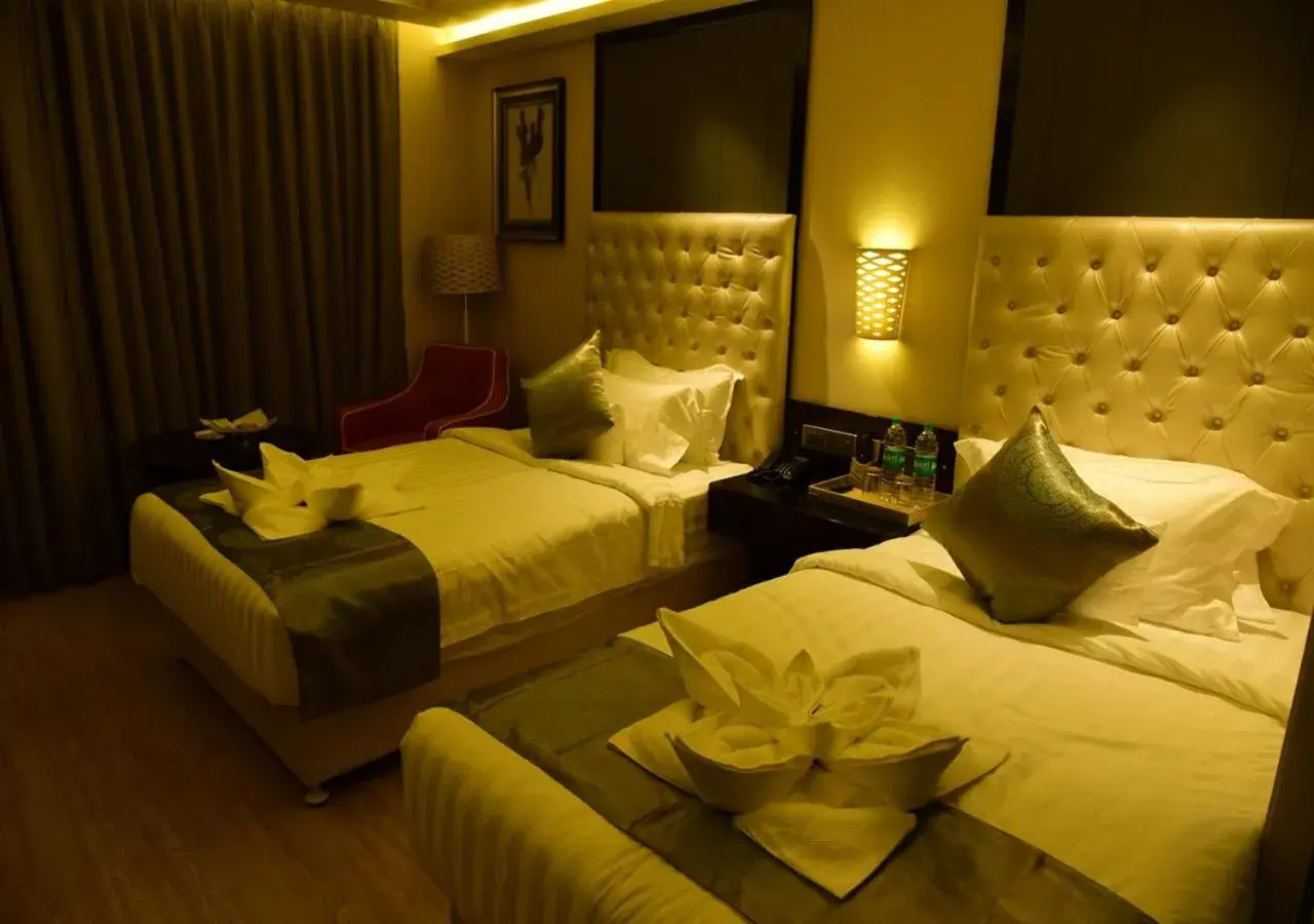 Bedroom, Bed in OM Clarks Inn Raebareli Bedroom, Bed in OM Clarks Inn Raebareli