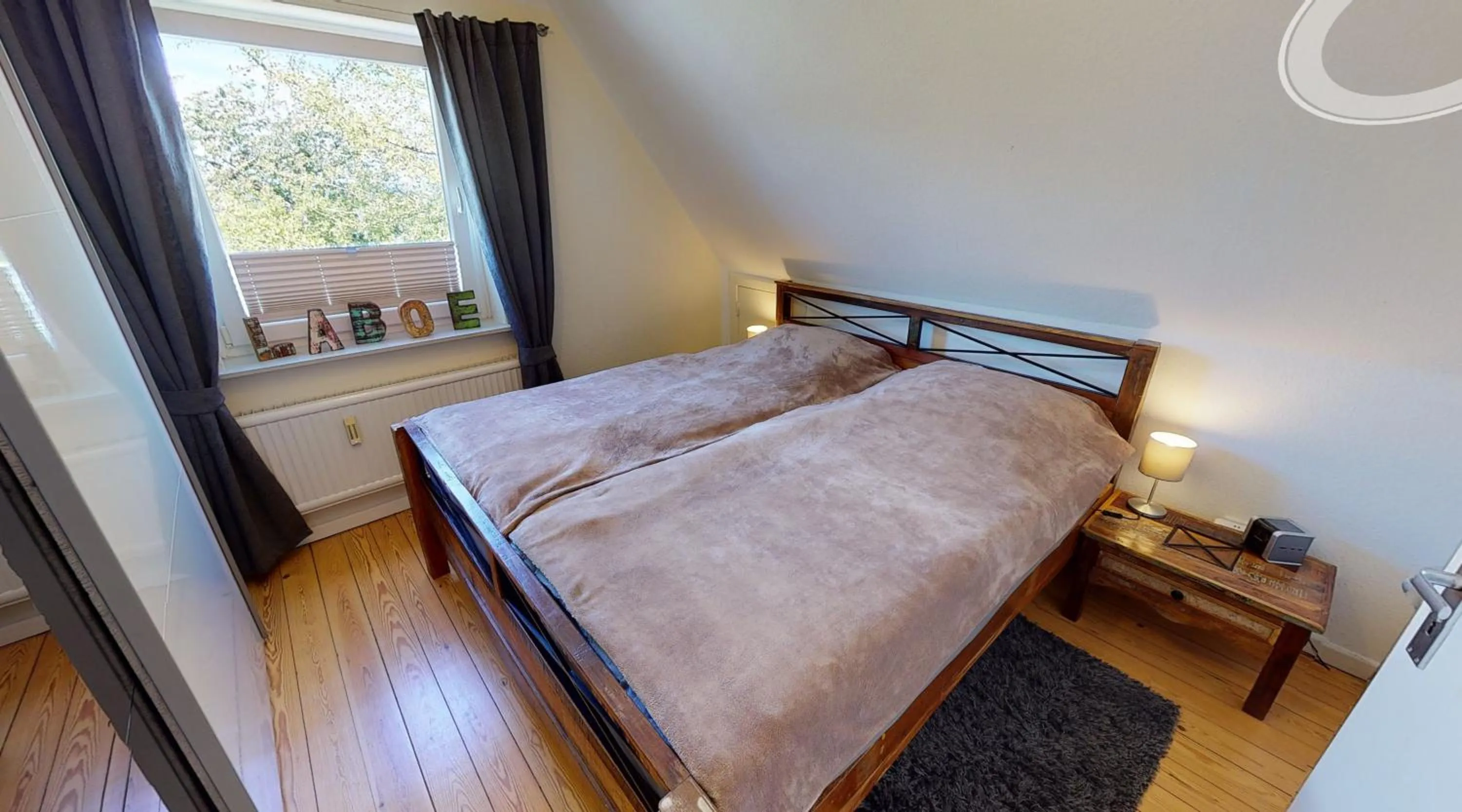 Bed in Ferienwohnung Nordlicht Laboe