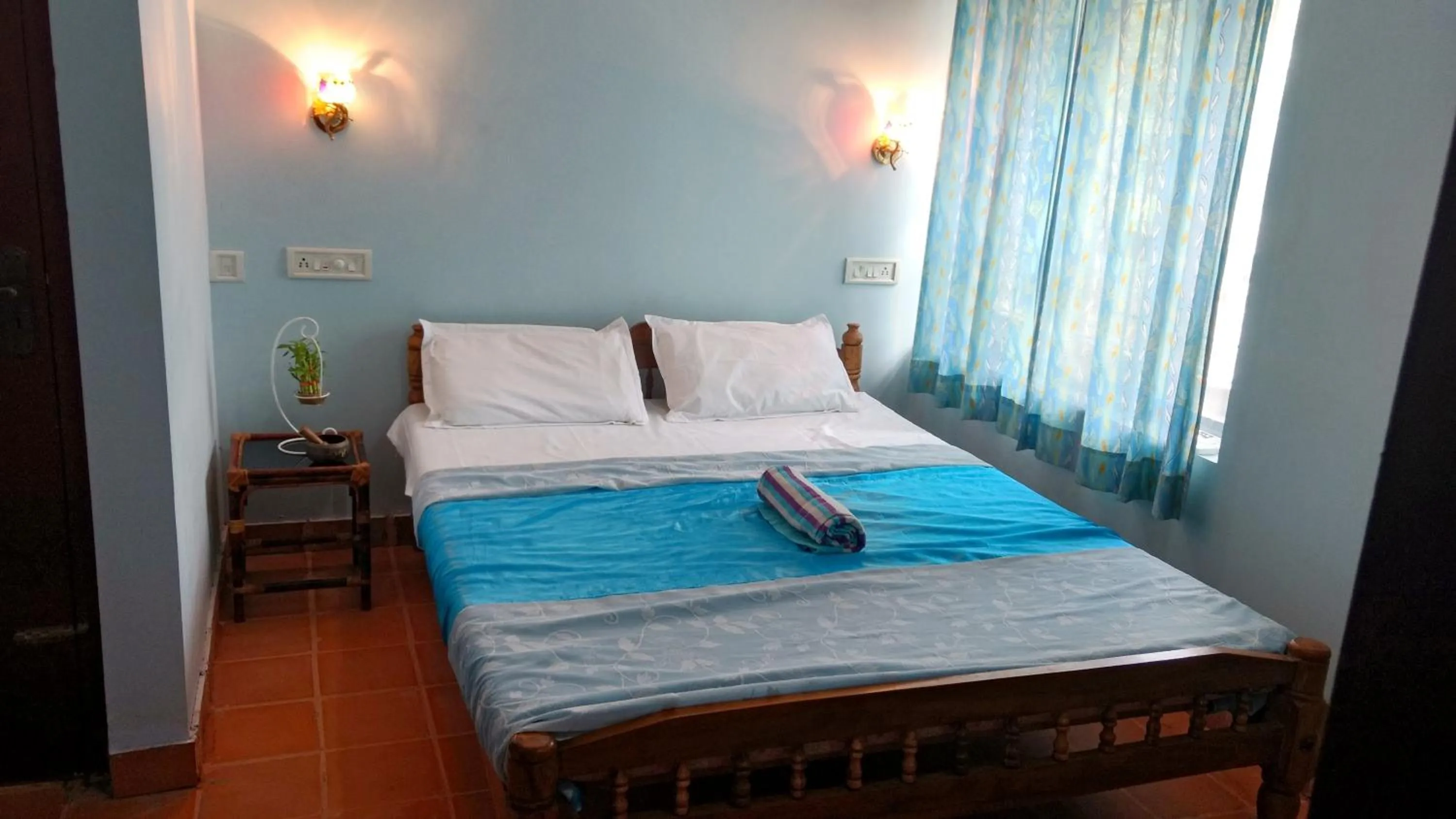 Bed in Kadalamma Beach Homestay
