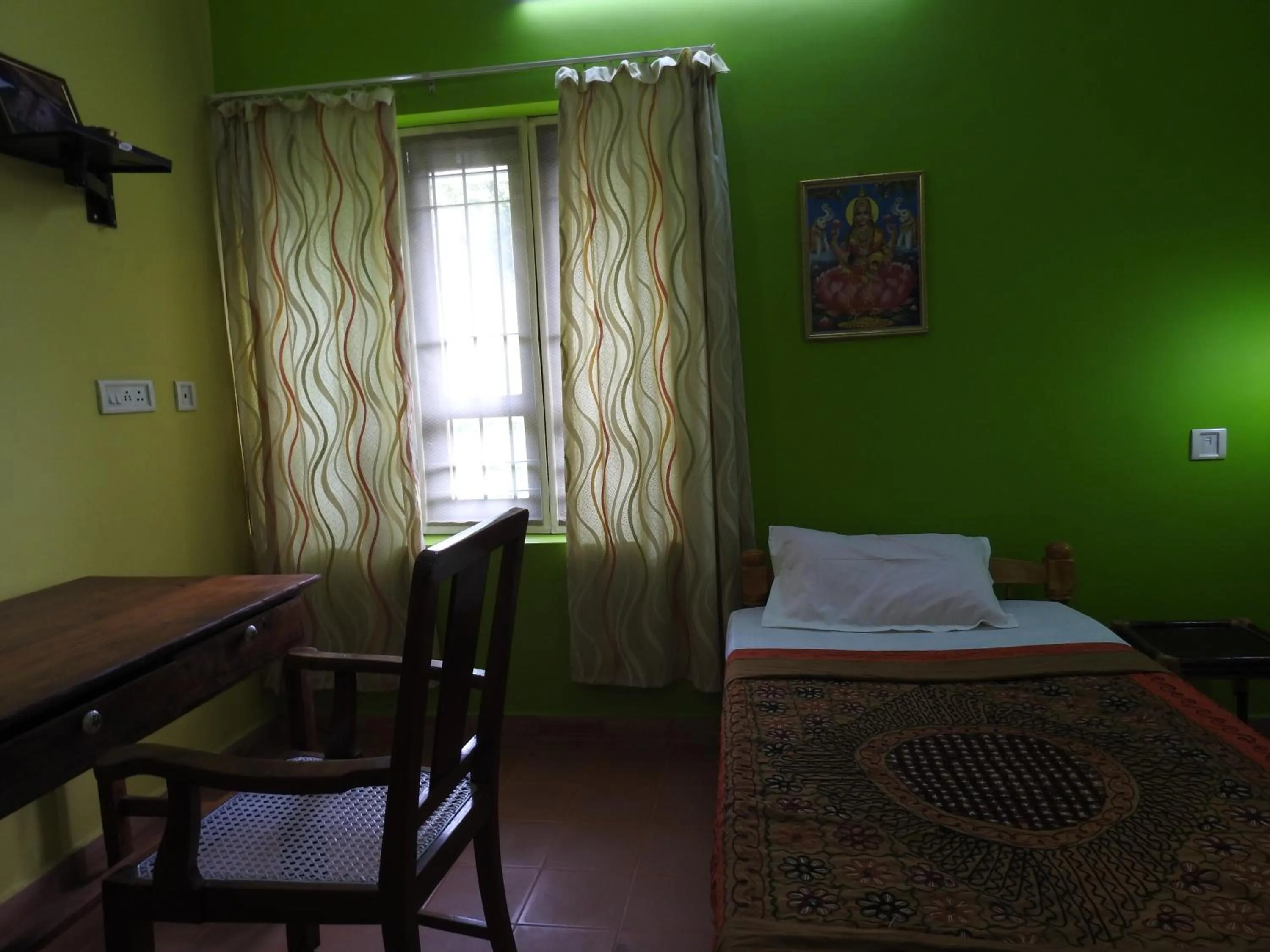 Bed in Kadalamma Beach Homestay
