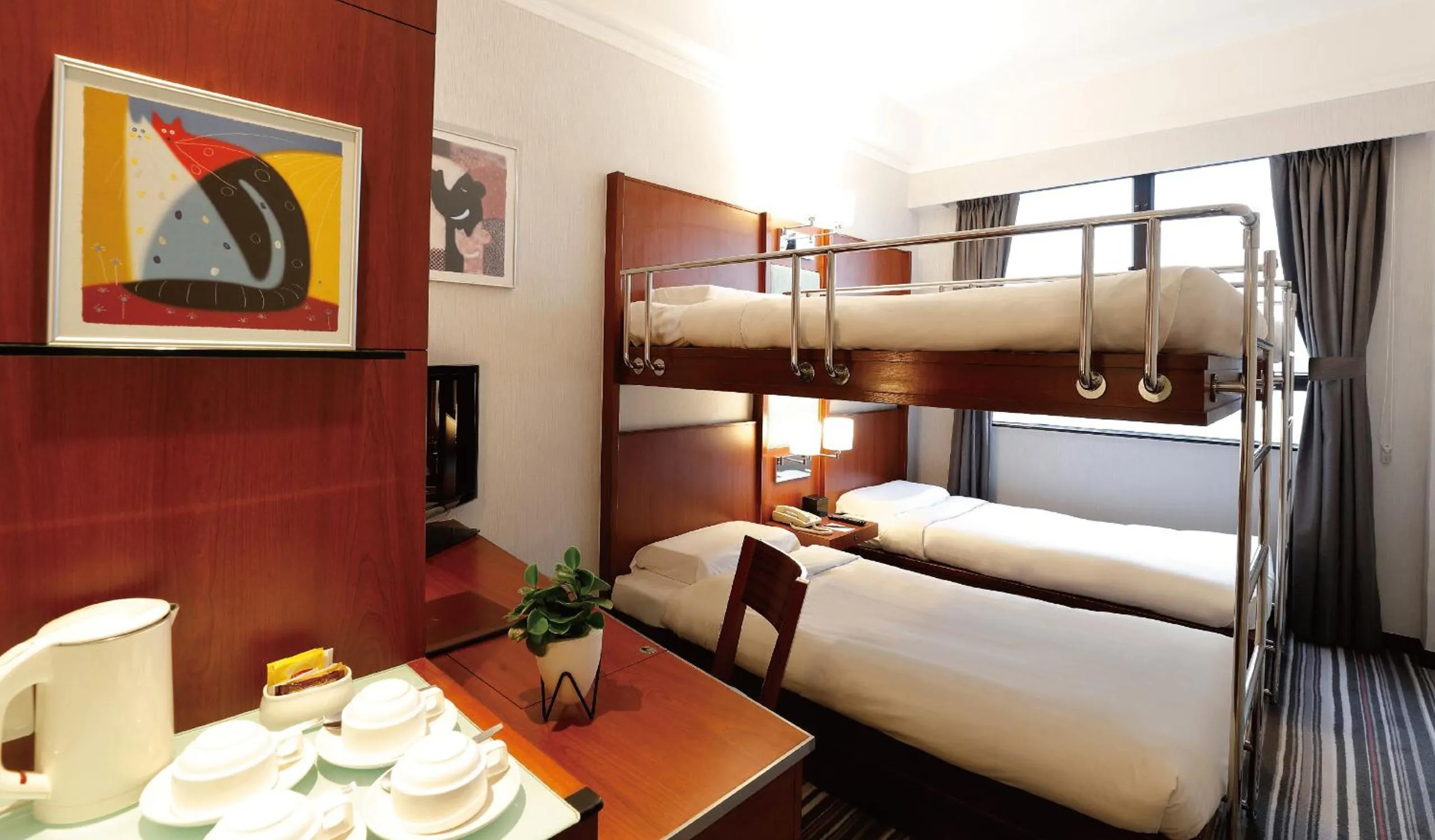 Photo of the whole room, Bed in B P International