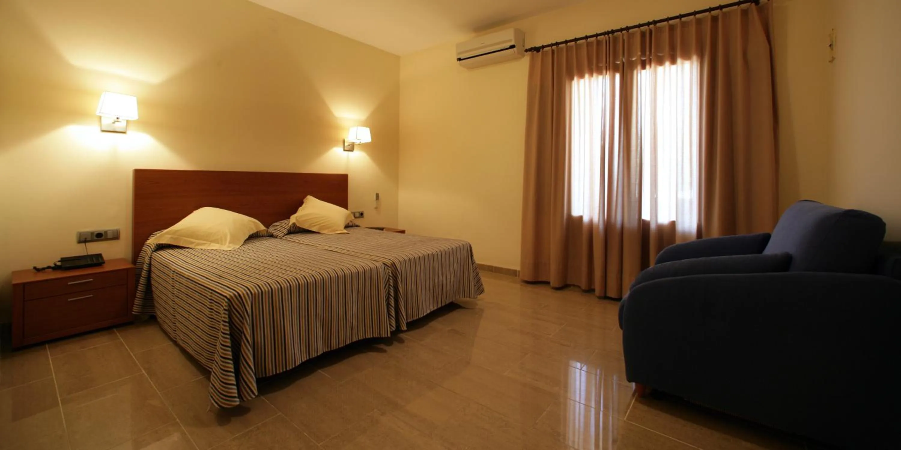 Bedroom in Hotel Sa Riera