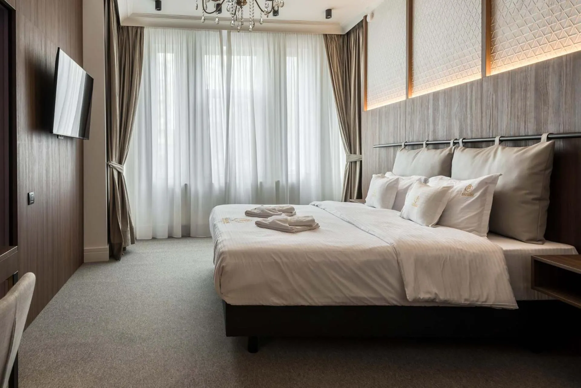 Photo of the whole room, Bed in HIGHLINE DOWNTOWN ApartHotel OLDTOWN UNIRII SQUARE