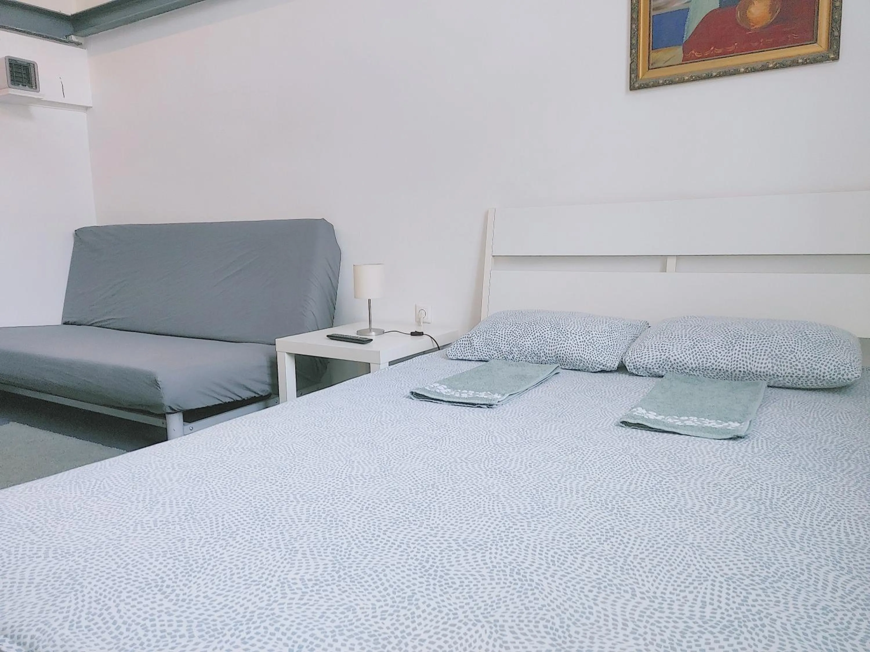 Bed in Sleepover City Center GuestRooms