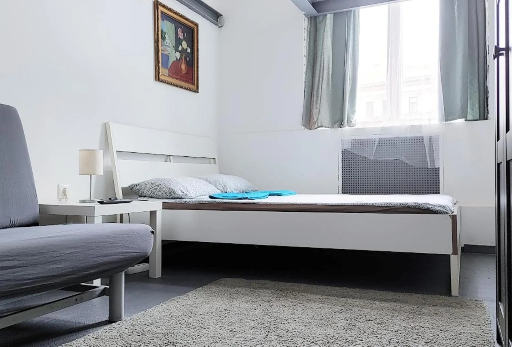 Bed in Sleepover City Center GuestRooms