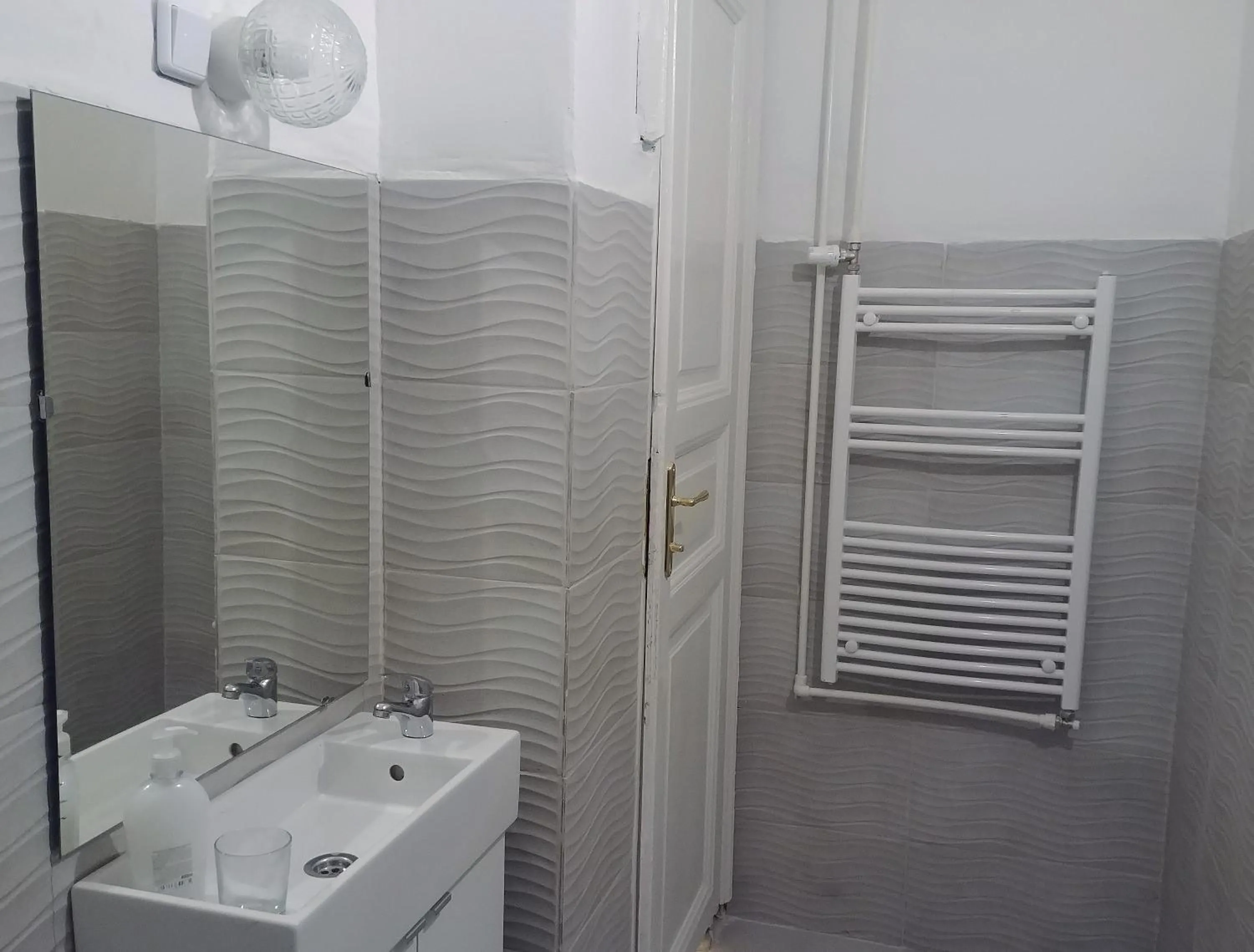 Toilet in Sleepover City Center GuestRooms
