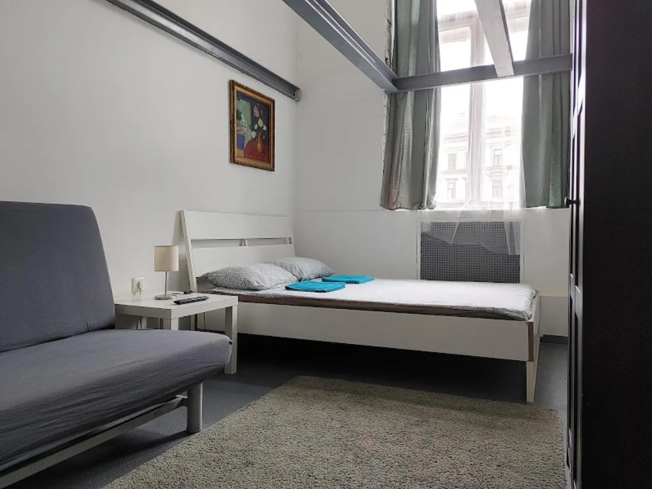 Bed in Sleepover City Center GuestRooms