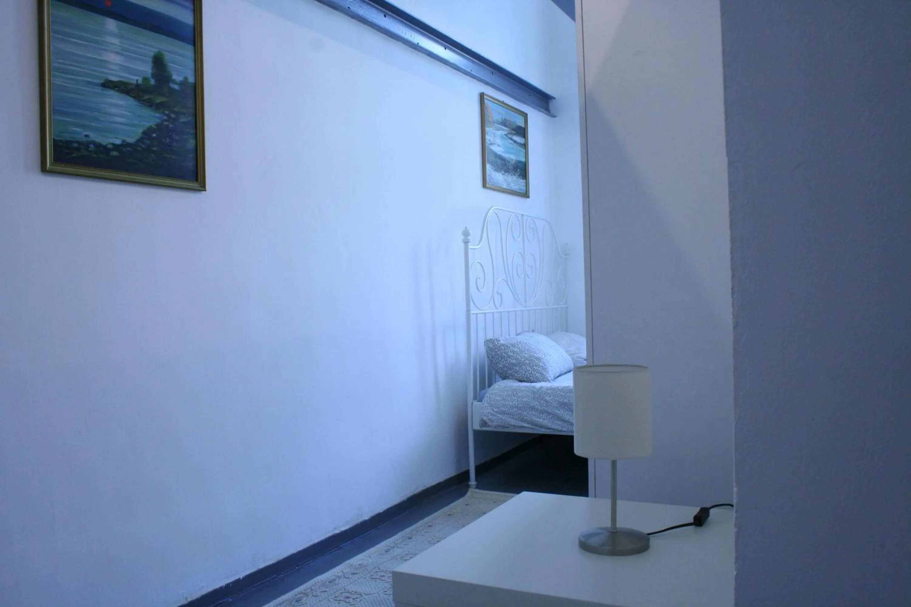 Bed in Sleepover City Center GuestRooms