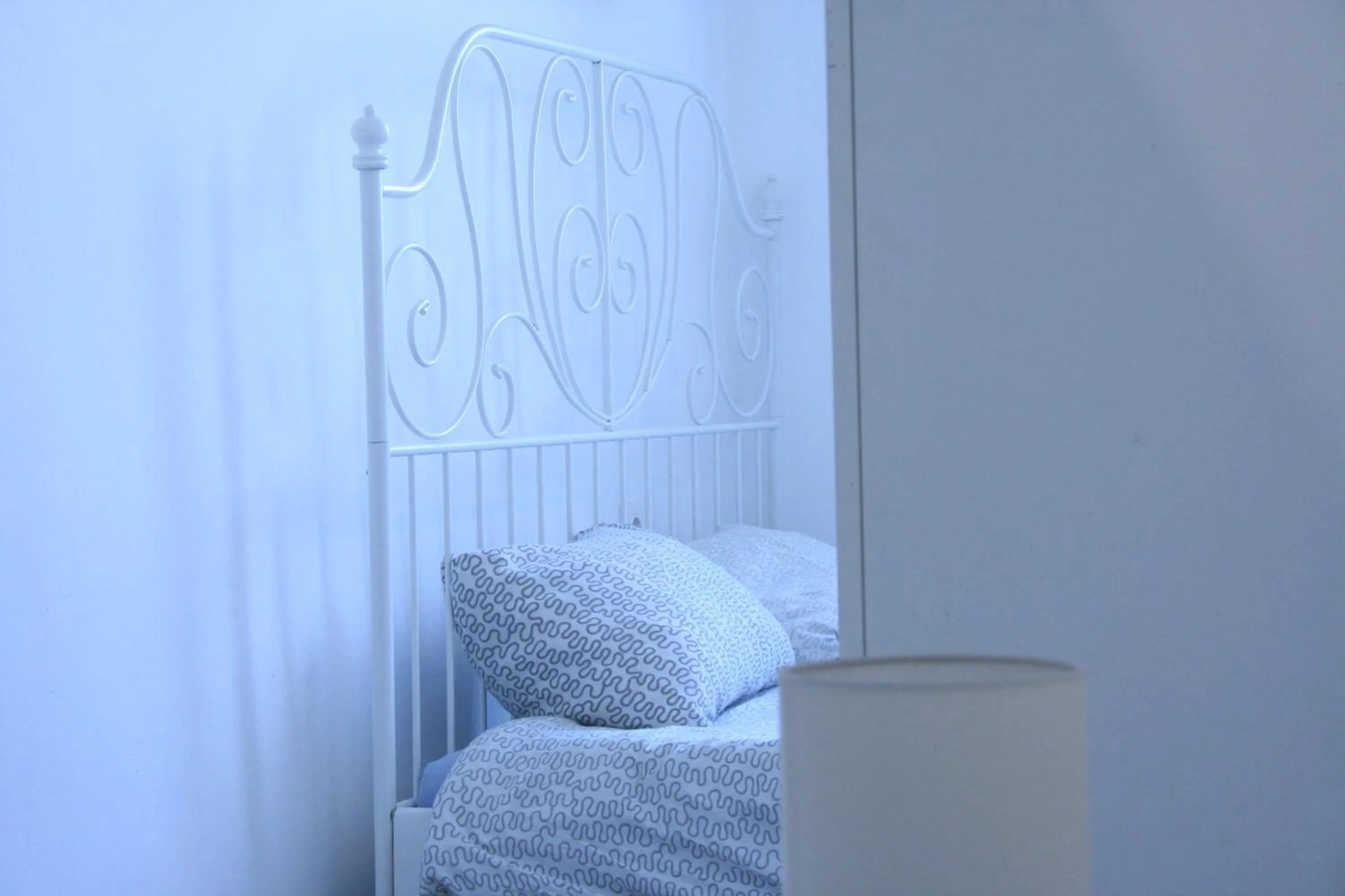 Bed in Sleepover City Center GuestRooms