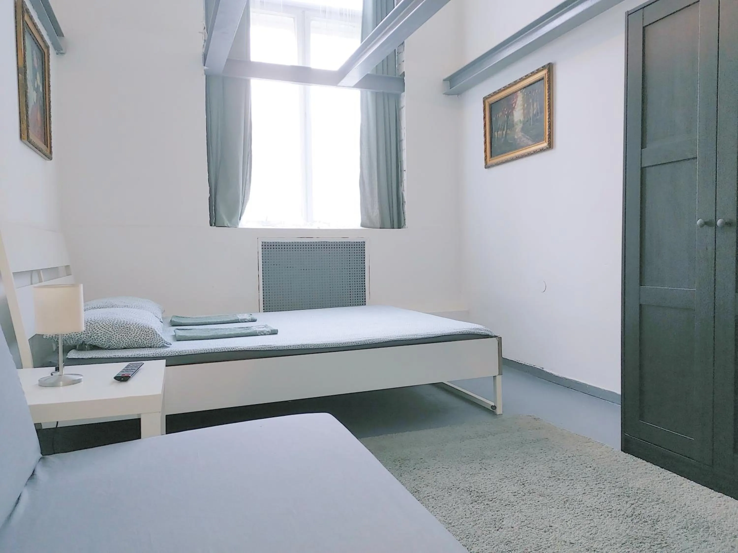 Bed in Sleepover City Center GuestRooms