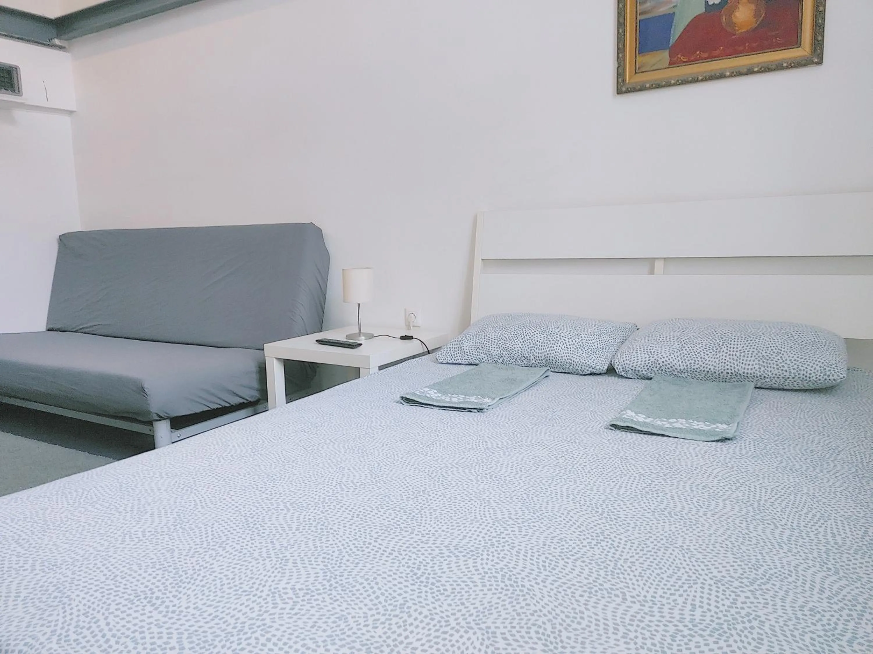 Bed in Sleepover City Center GuestRooms