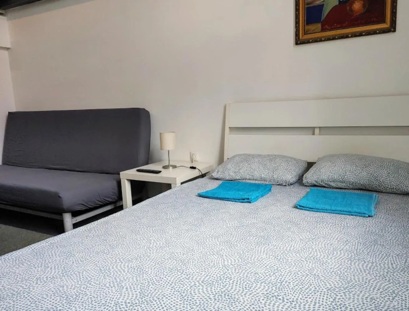 Bed in Sleepover City Center GuestRooms