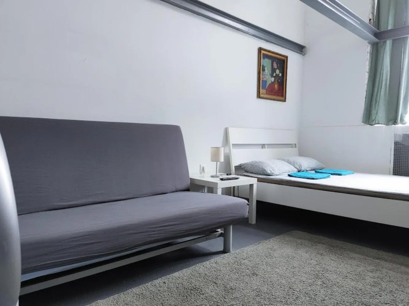 Bed in Sleepover City Center GuestRooms