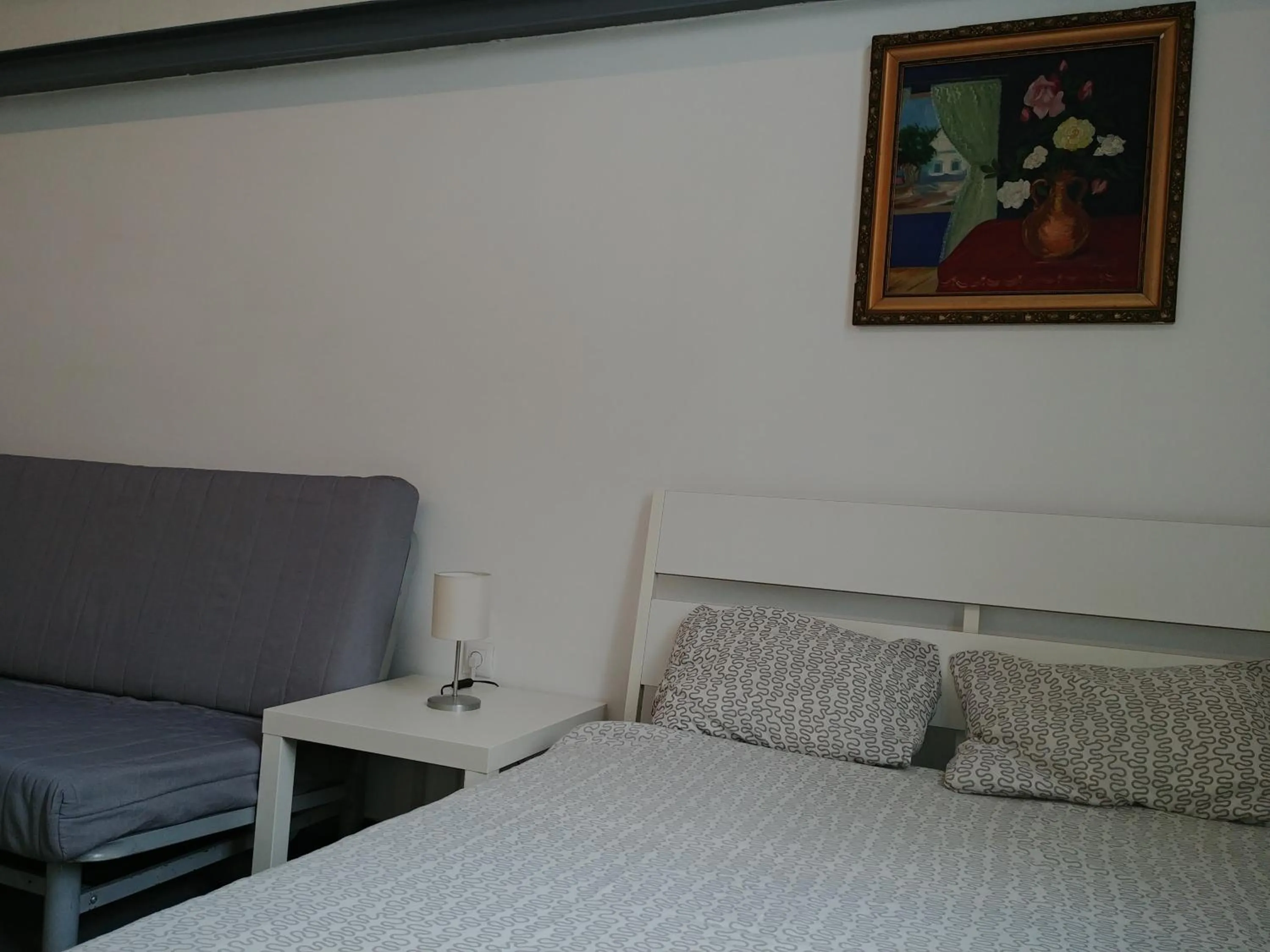 Bed in Sleepover City Center GuestRooms
