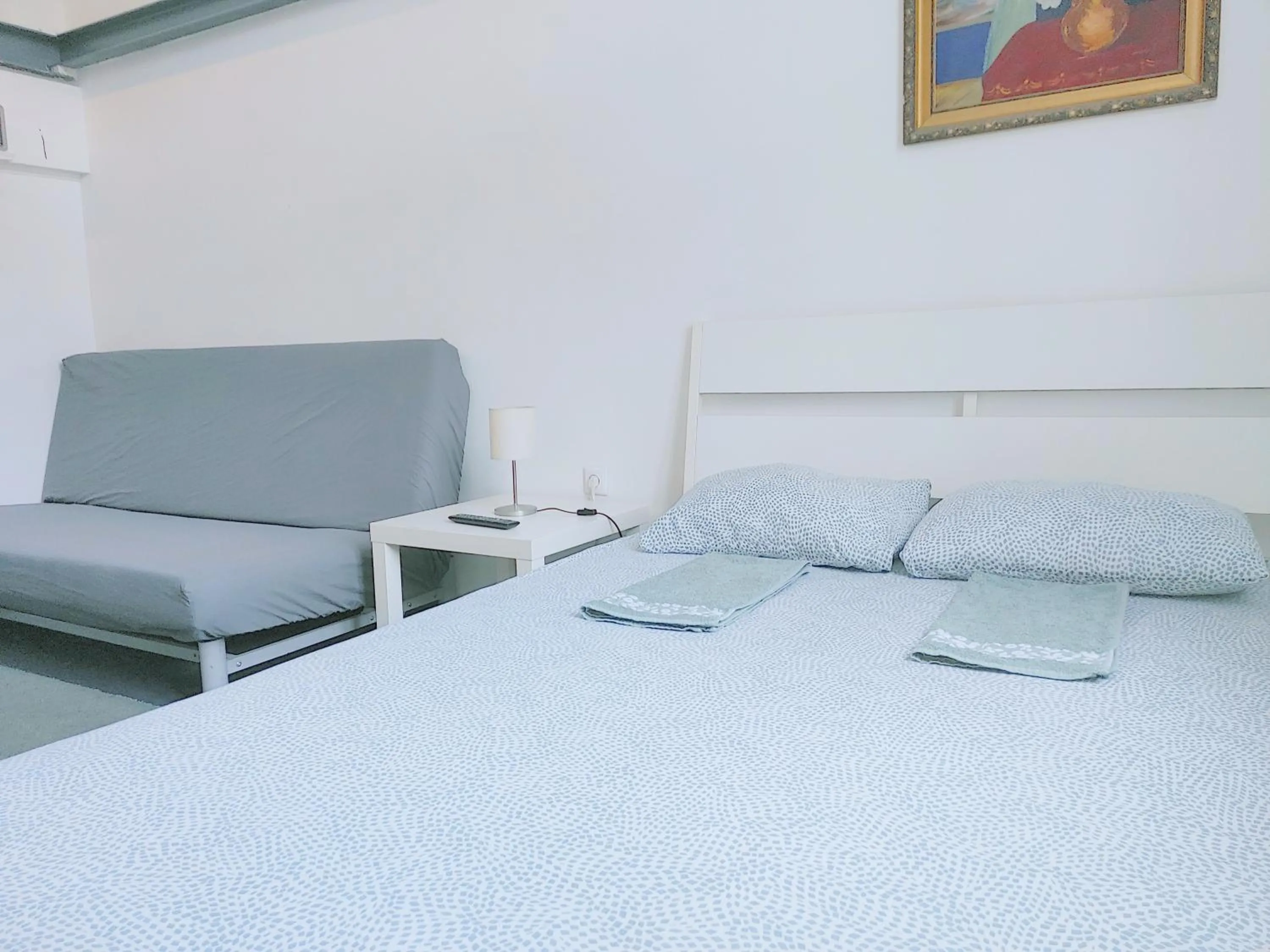 Bed in Sleepover City Center GuestRooms