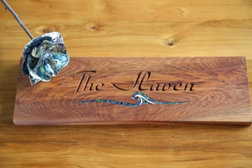 Logo/Certificate/Sign in Gems Seaside Lodge