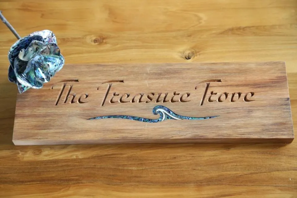 Logo/Certificate/Sign in Gems Seaside Lodge