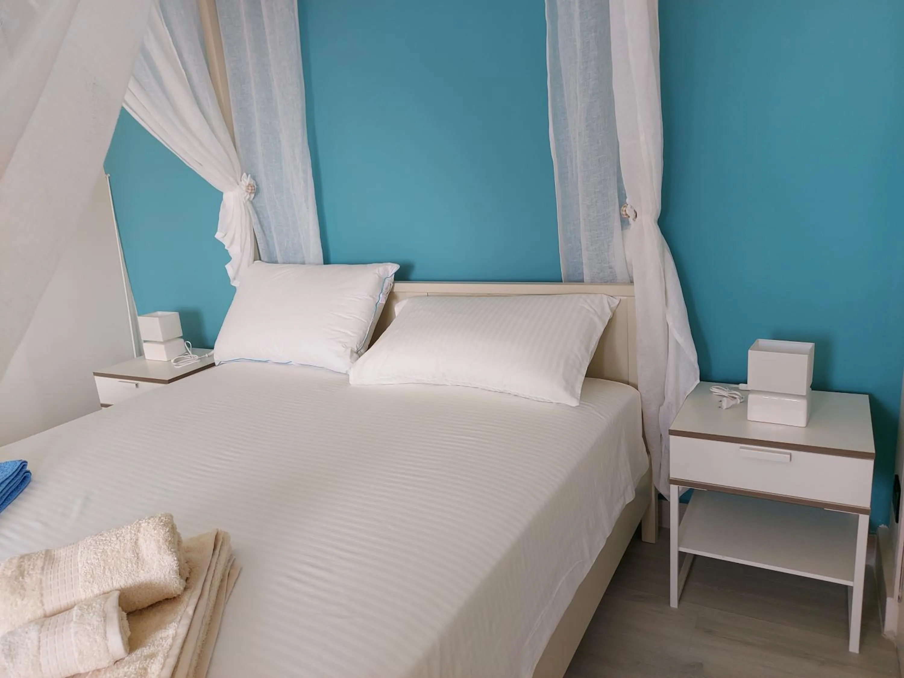 Bed in Attico Sottovento