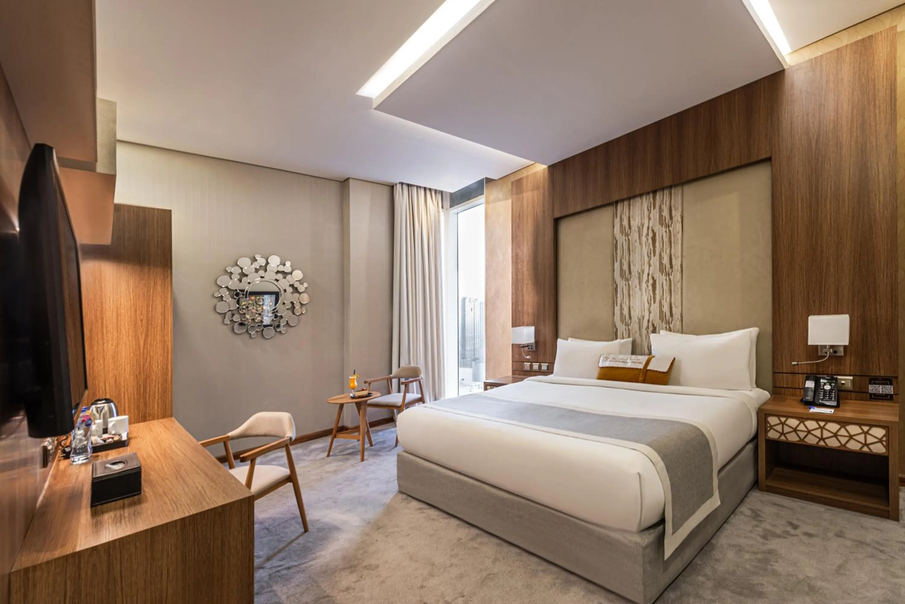 Bed in Crown Rose Al Sahafa Hotel