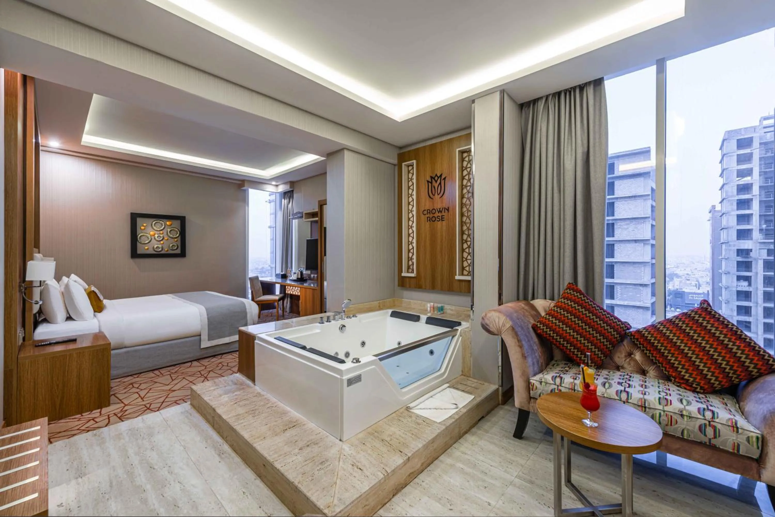 Bed in Crown Rose Al Sahafa Hotel