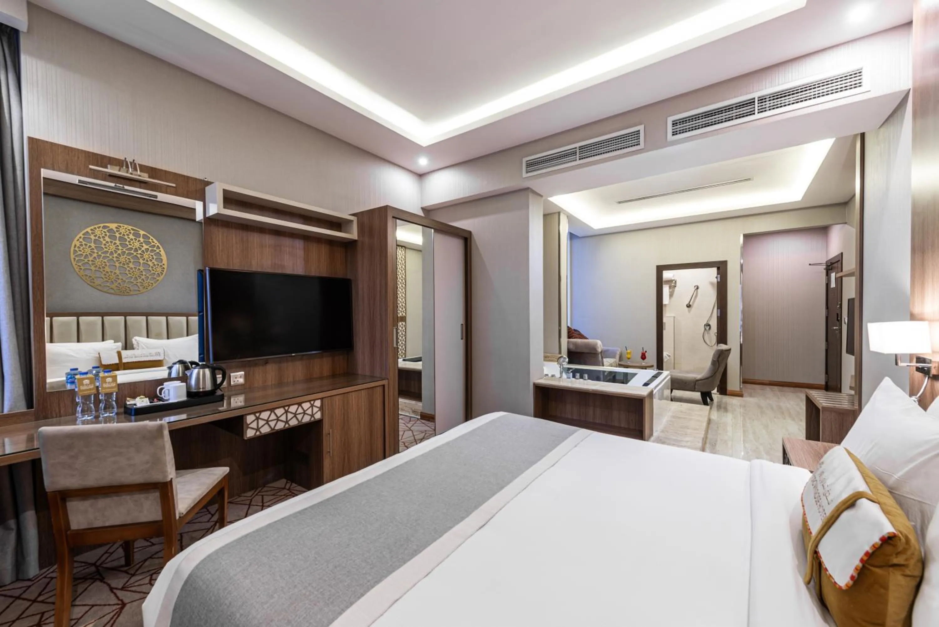 Bed in Crown Rose Al Sahafa Hotel