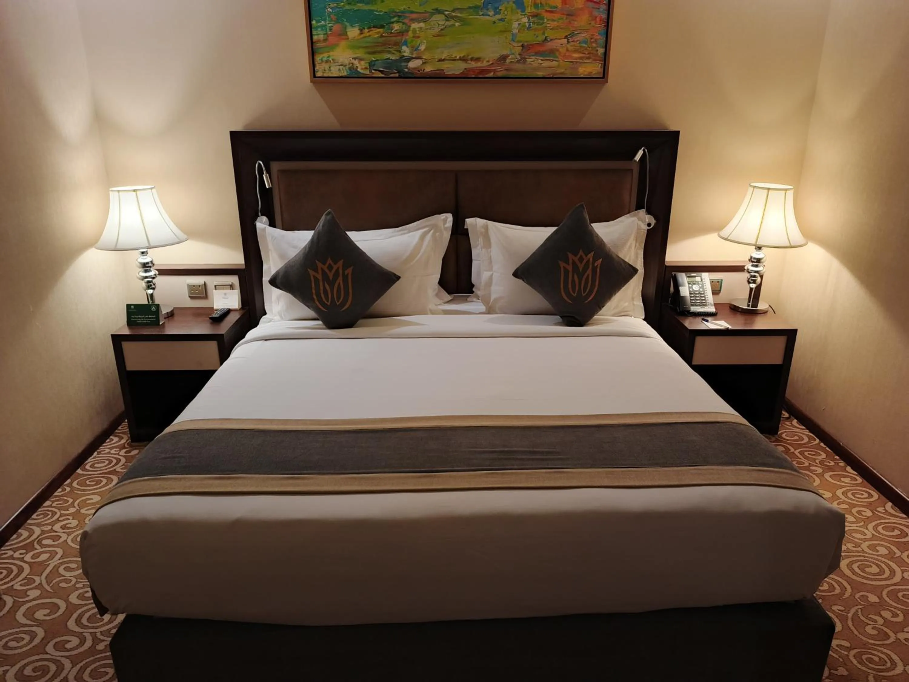 Bed in Crown Rose Al Sahafa Hotel