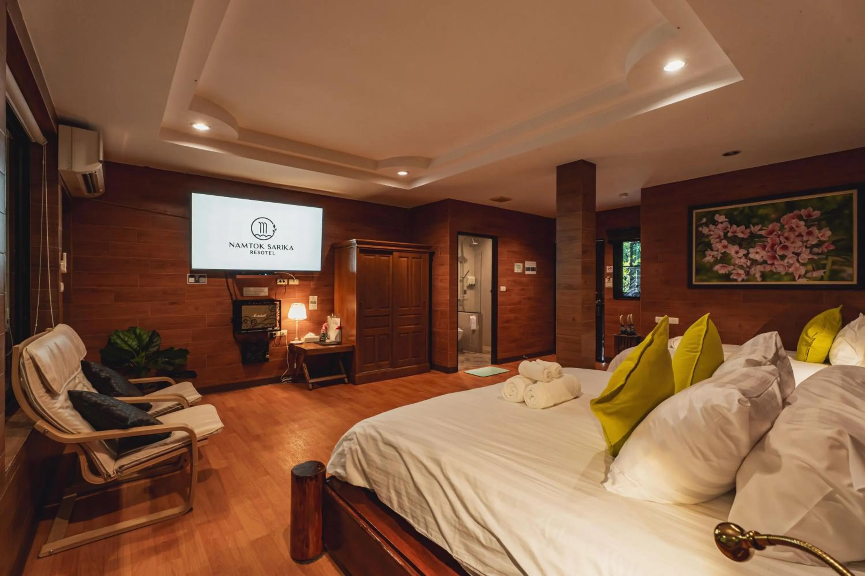 Bed in Namtok Sarika Resotel