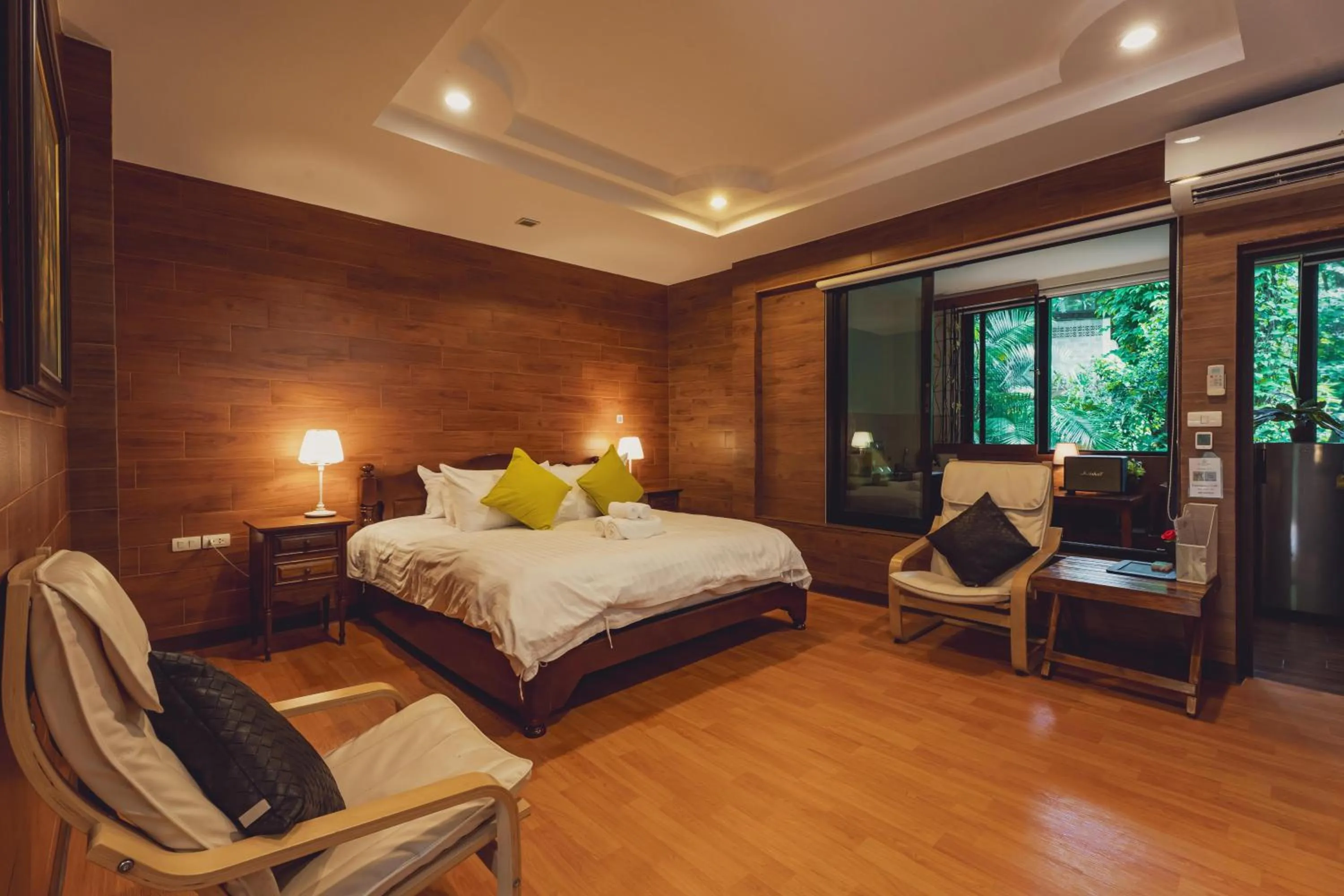 Bed in Namtok Sarika Resotel