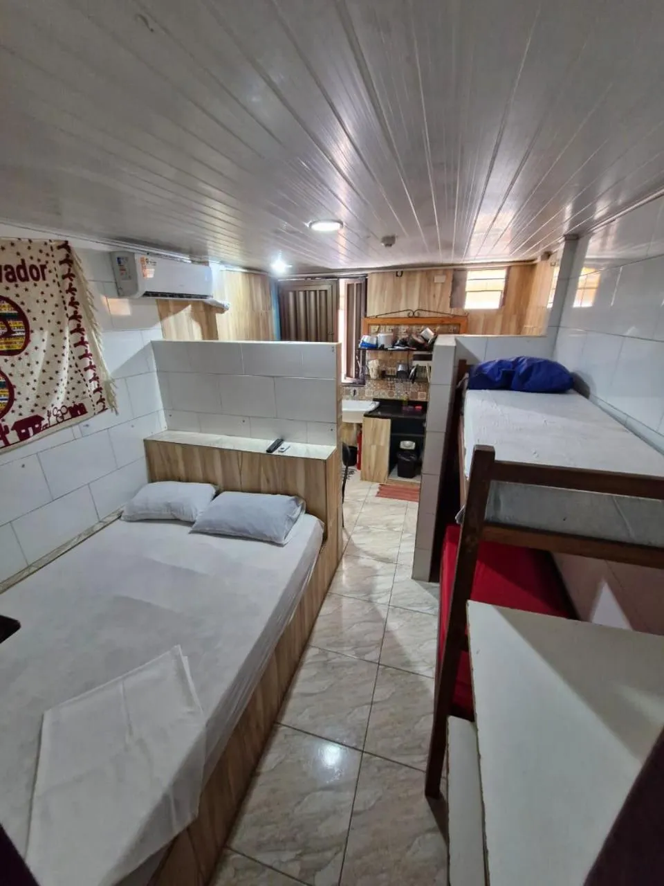 Bed in Kitnets com AR Condicionado na Praia