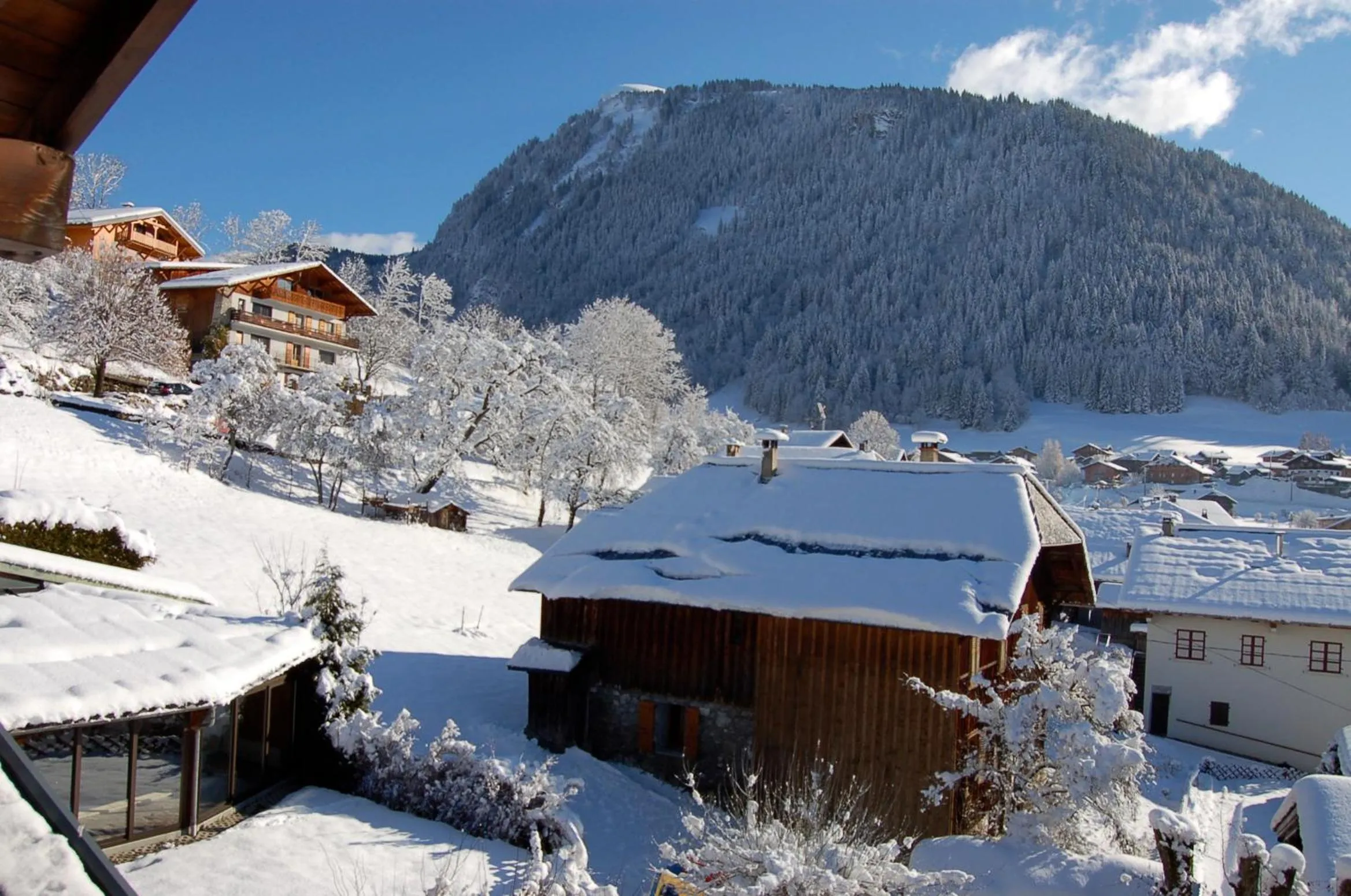 Garden view in Hôtel Les Côtes, Résidence Loisirs et Chalets