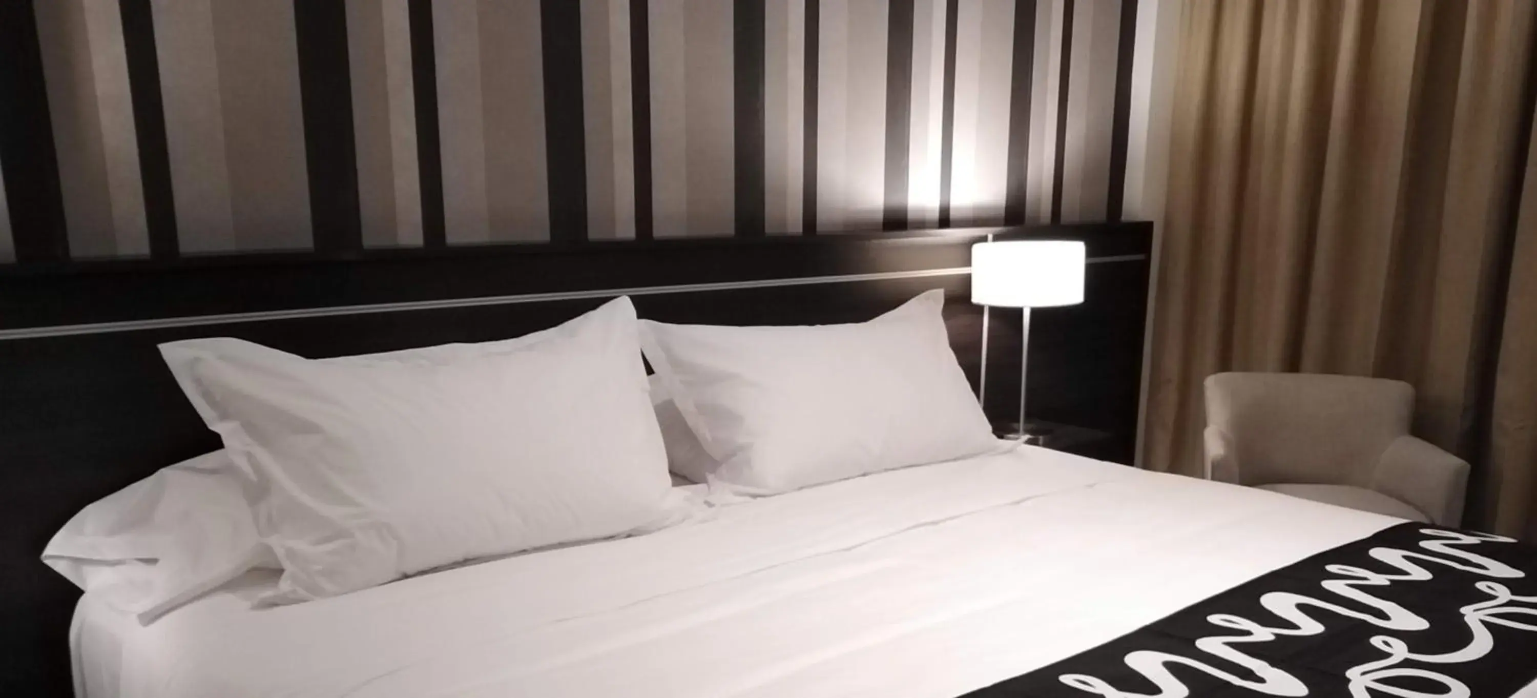 Bed in Amerian Rafaela Hotel Bed in Amerian Rafaela Hotel