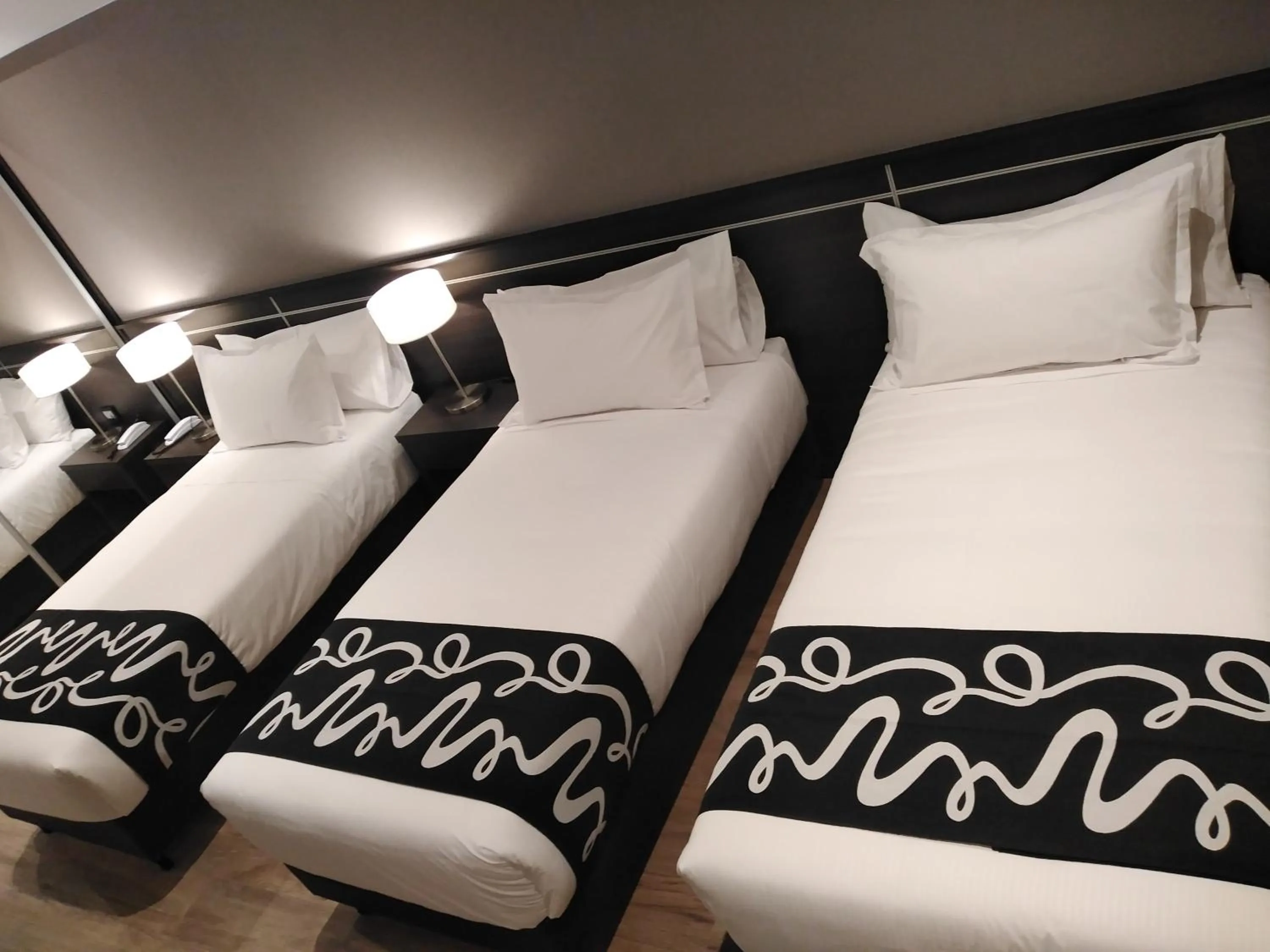 Bed in Amerian Rafaela Hotel