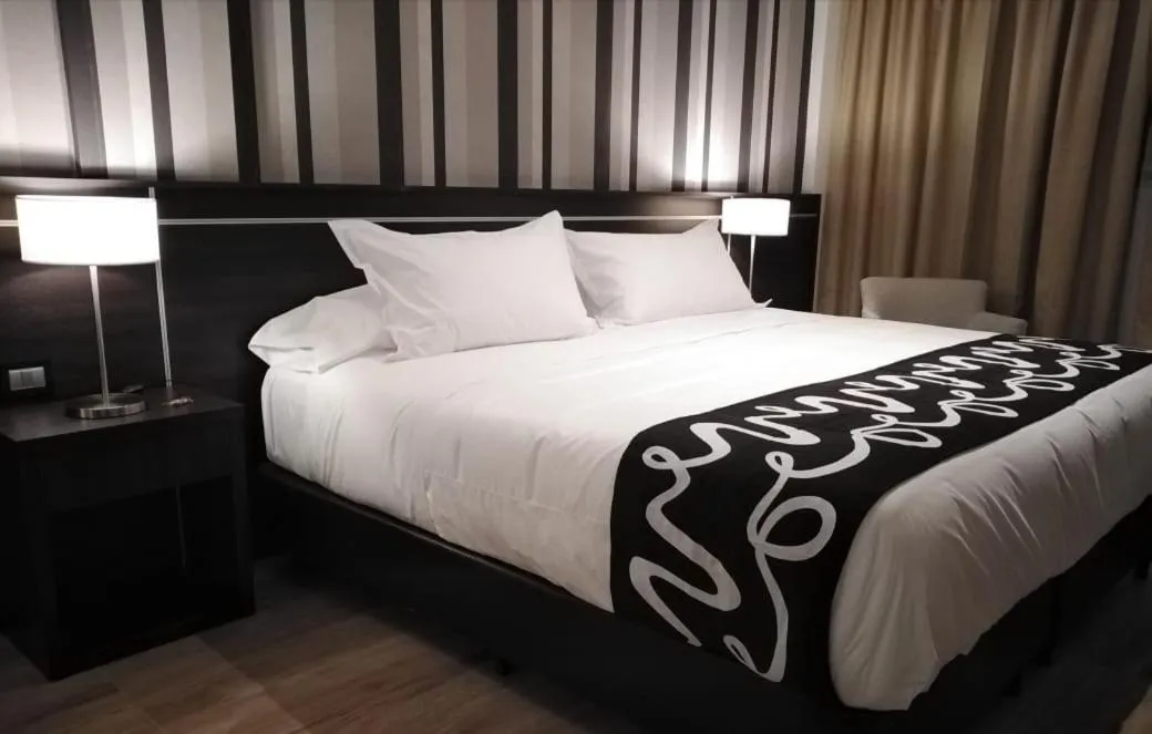Bed in Amerian Rafaela Hotel