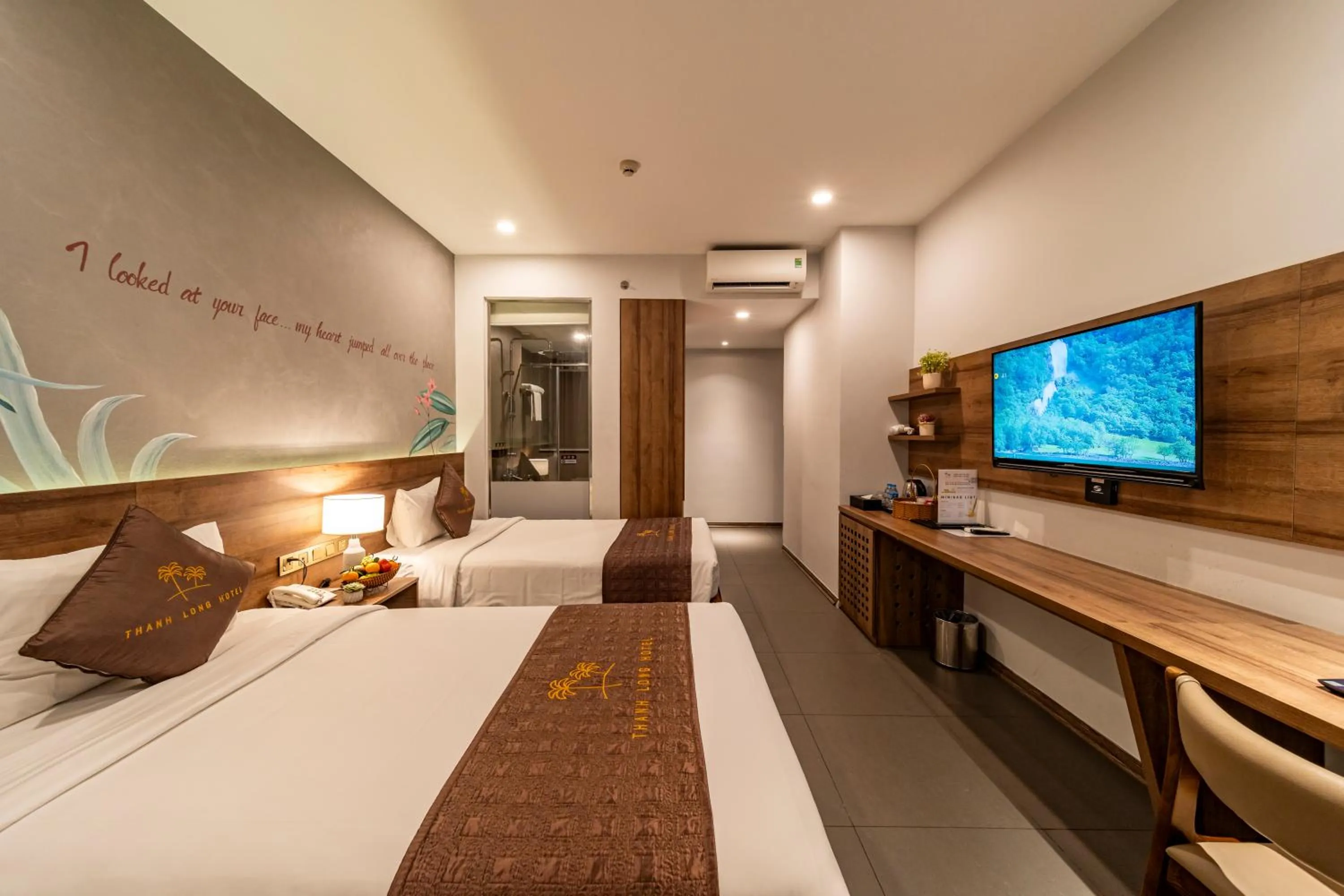 Photo of the whole room, Bed in Thanh Long Hotel - Tra Khuc