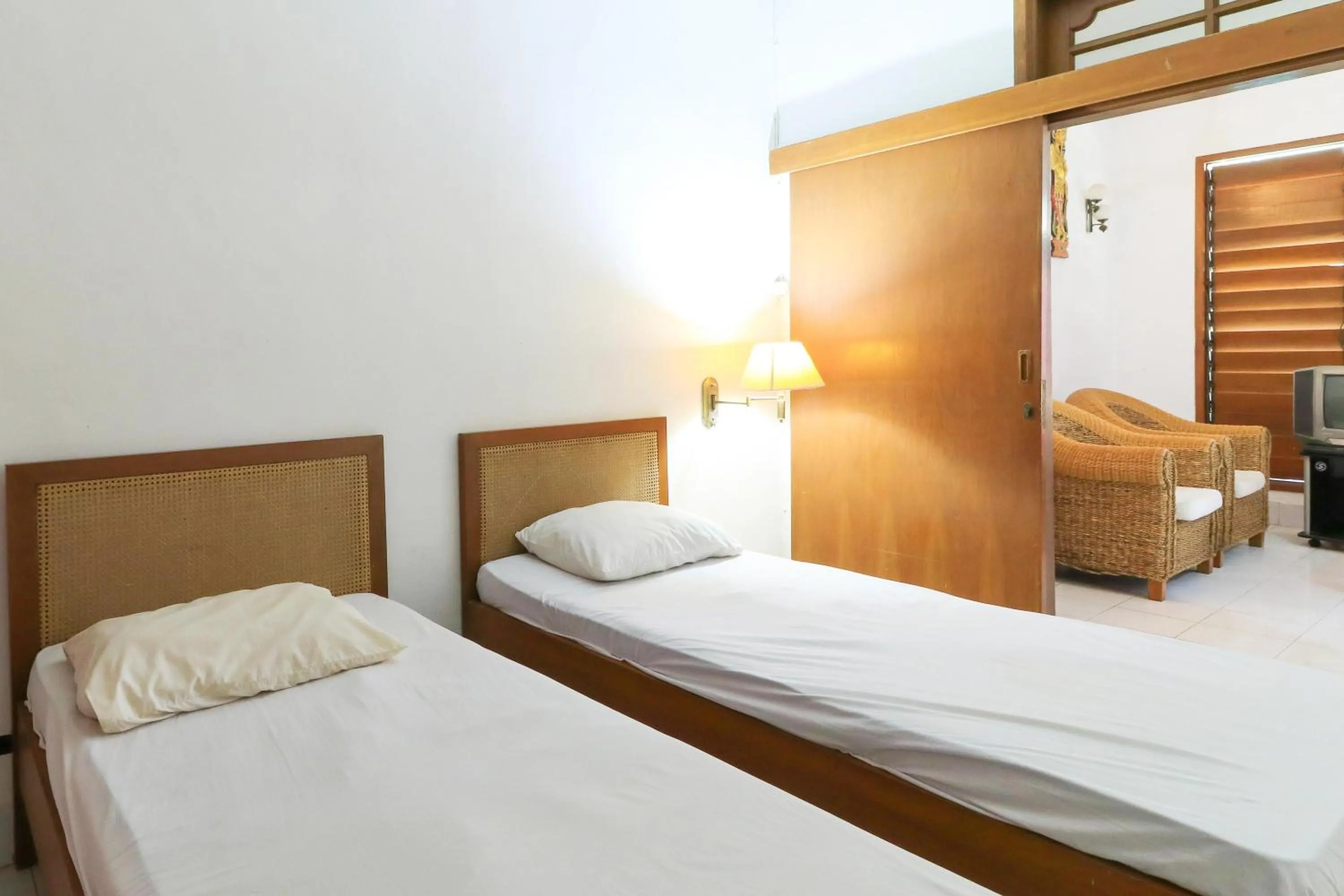 Bed in Sari Bali Resort