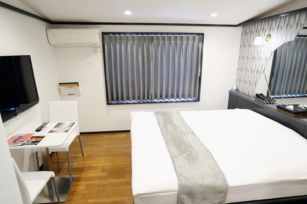 Bed in HOTEL LEX Numazu (Adult Only)