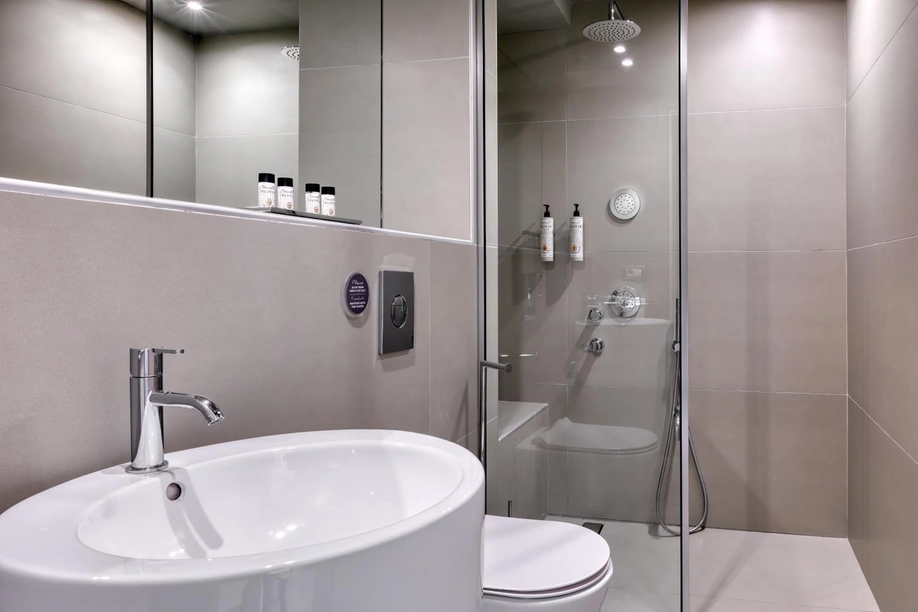 Bathroom in Flisvos Royal Hotel & Suites