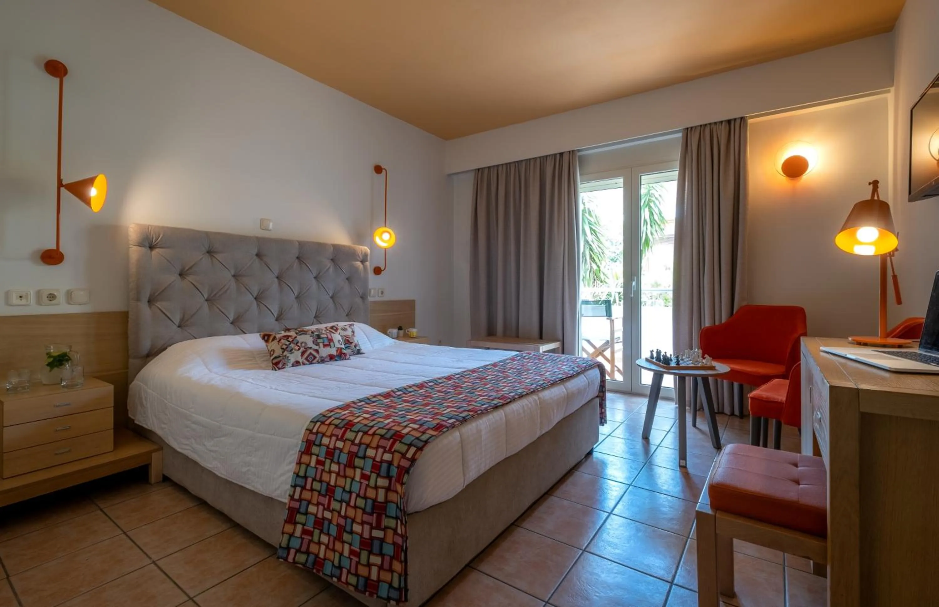 Bed in Flisvos Royal Hotel & Suites