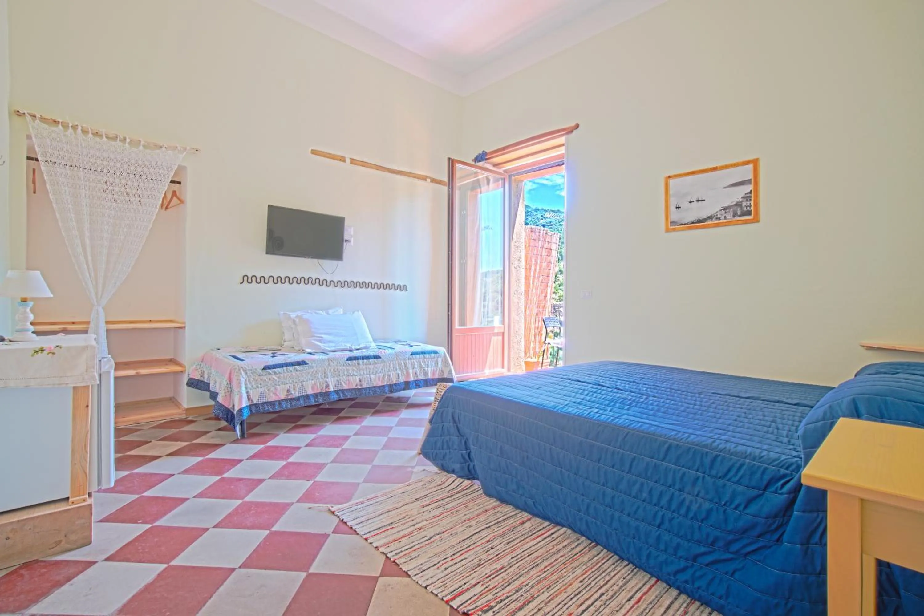 Bed in La Casa sul Blu Albergo Diffuso