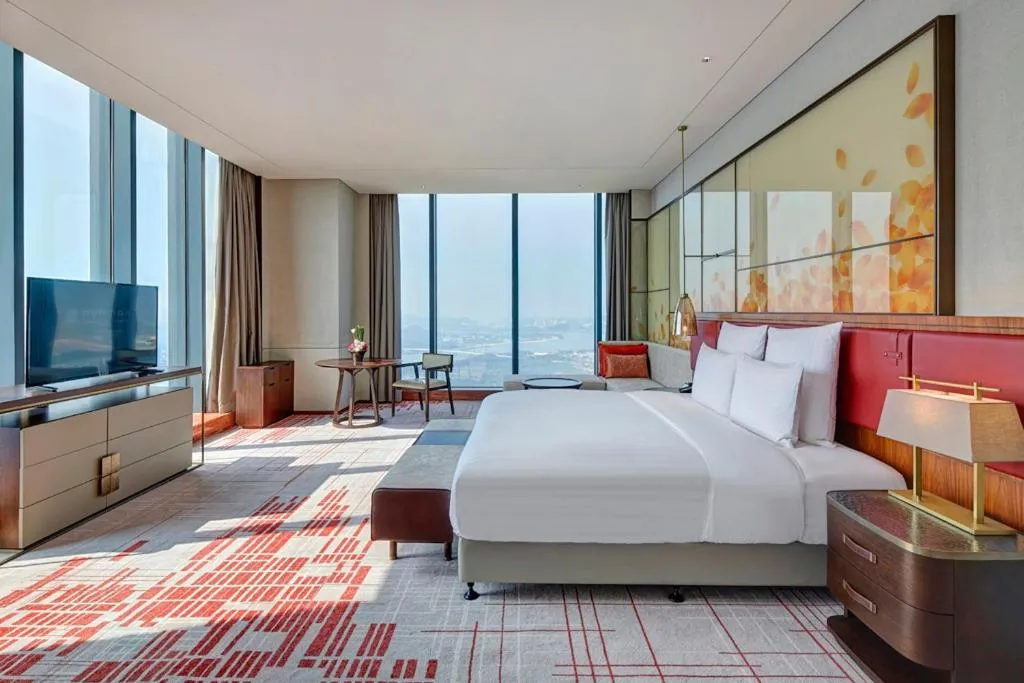 Photo of the whole room, Bed in Pullman Huizhou Kaisa