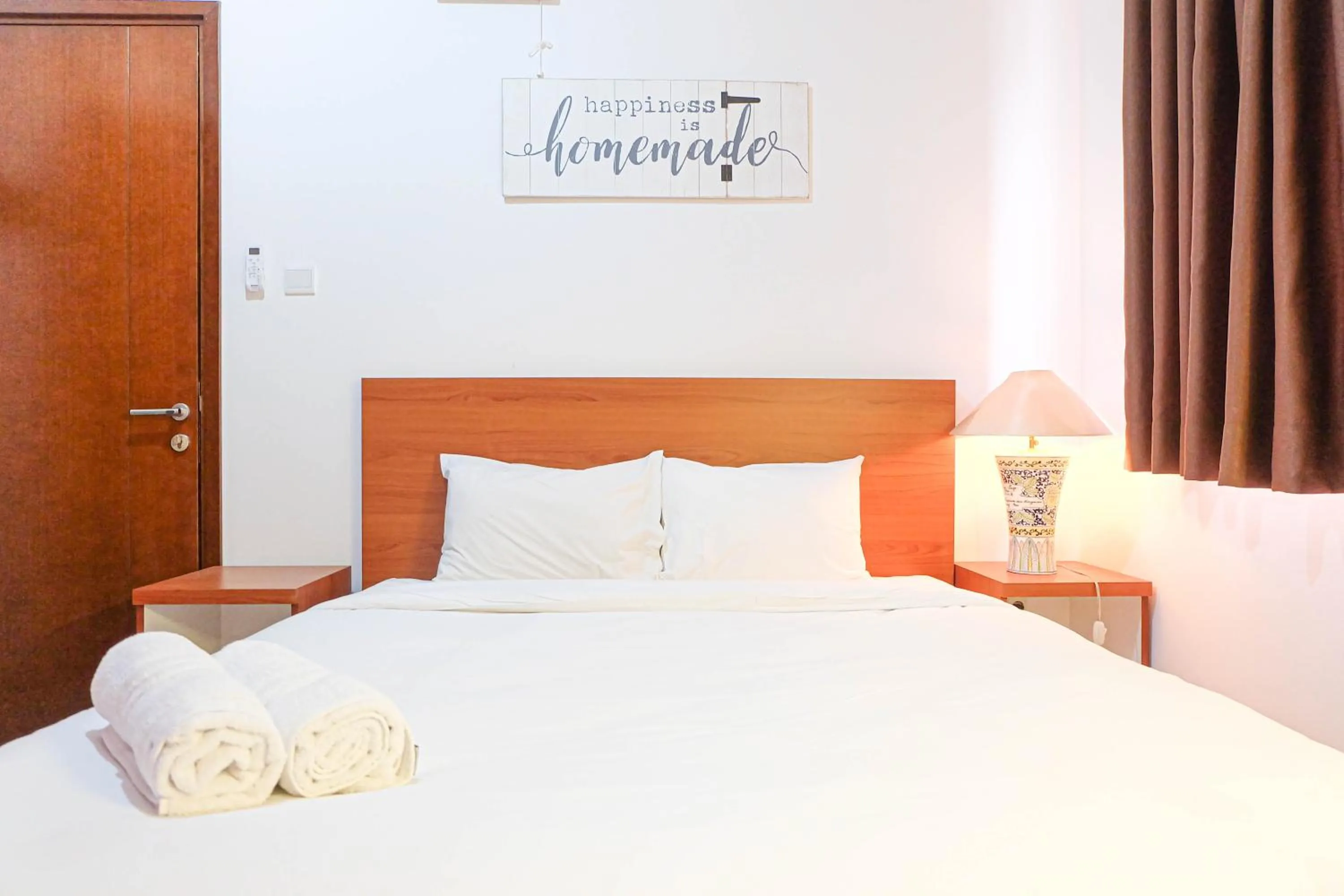 Bedroom in Fabulous 2BR Signature Park Grande Apartment By Travelio