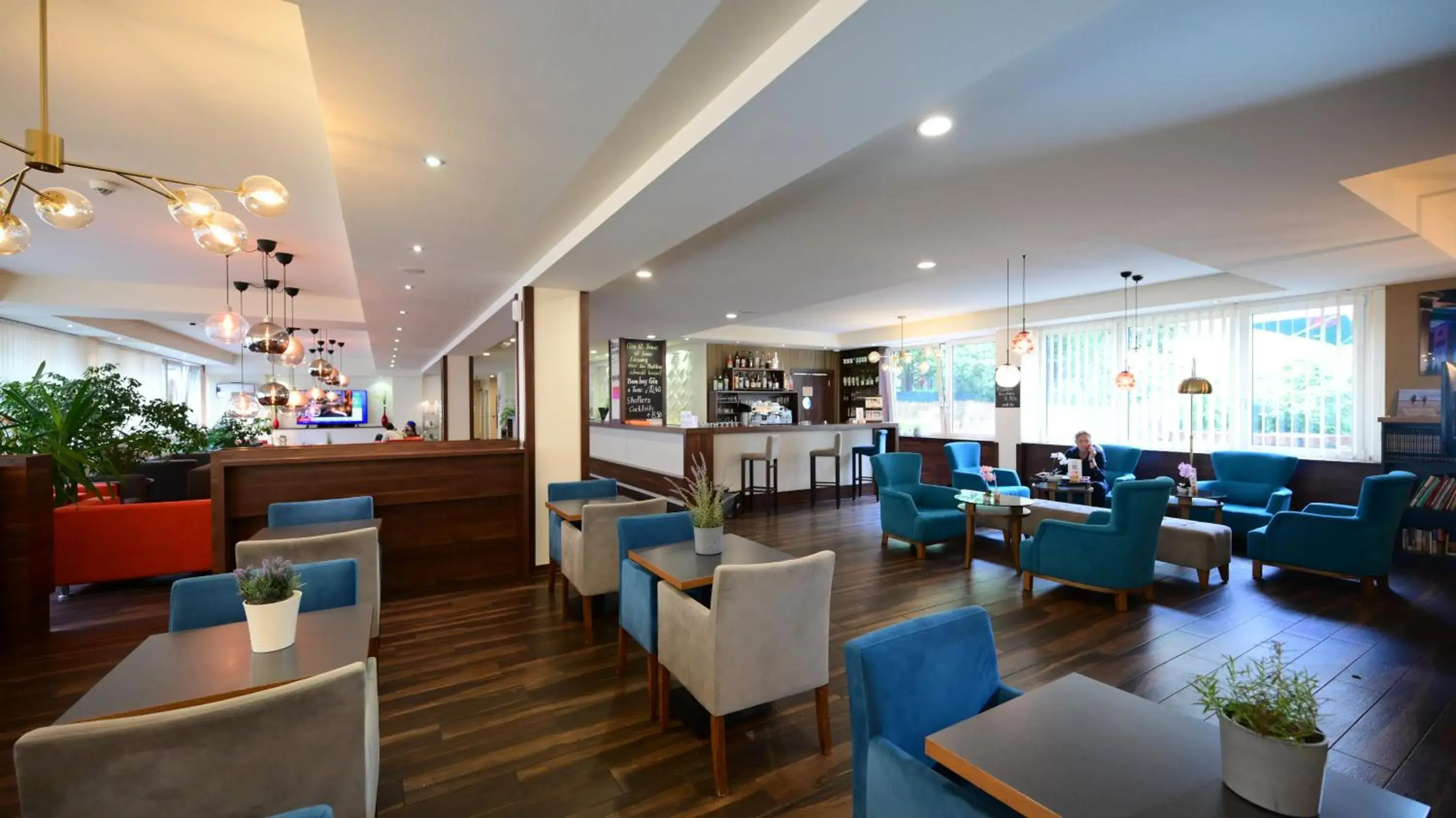 Lounge or bar in Motel Plus Berlin Lounge or bar in Motel Plus Berlin