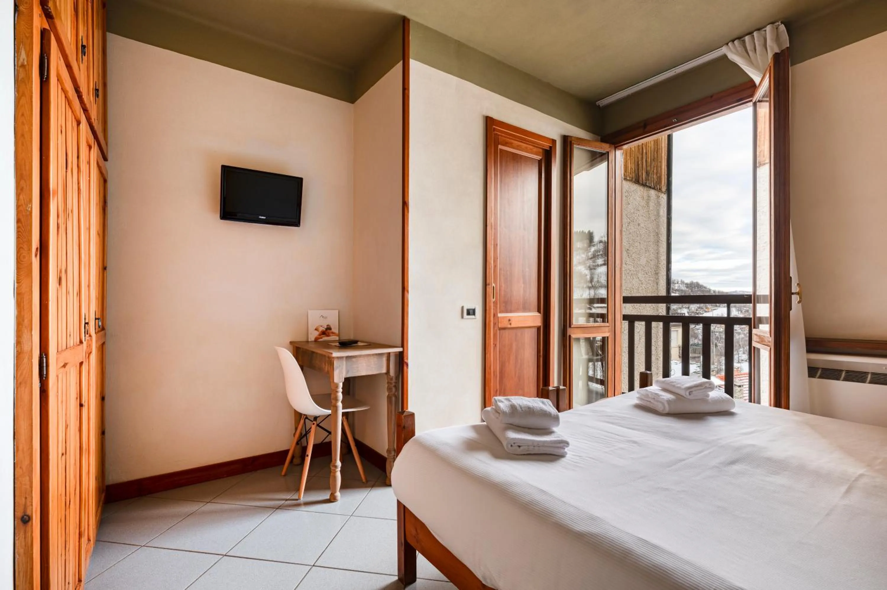 Photo of the whole room, Bed in Hotel Miramonti Family & SPA