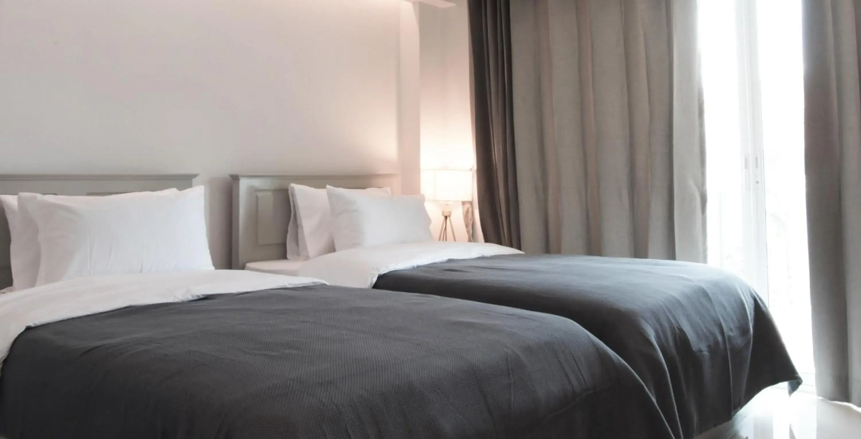 Bed in Tonkla Boutique Hotel Bed in Tonkla Boutique Hotel