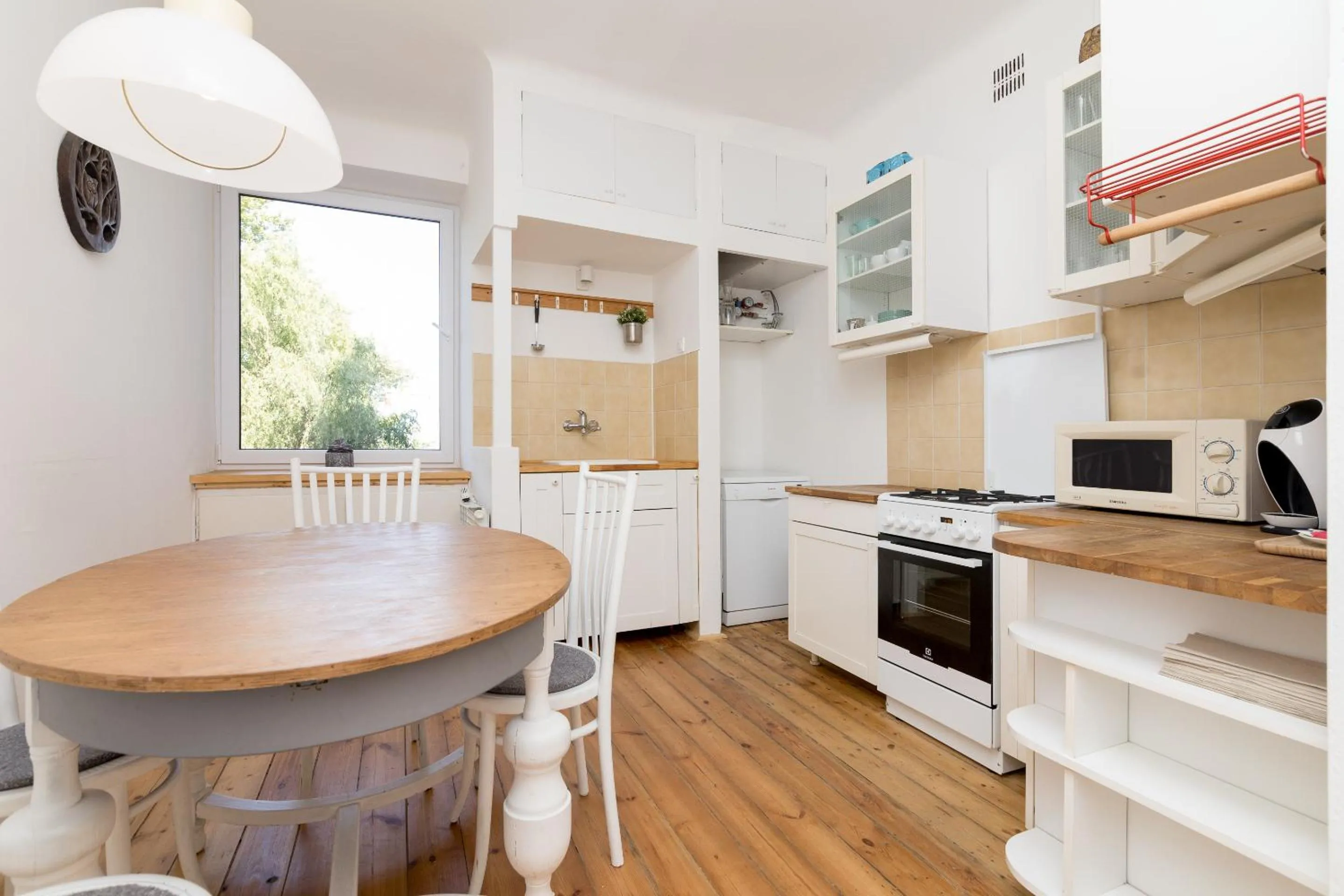 Kitchen or kitchenette in Royal Route Apartment for 10 people by BookingHost