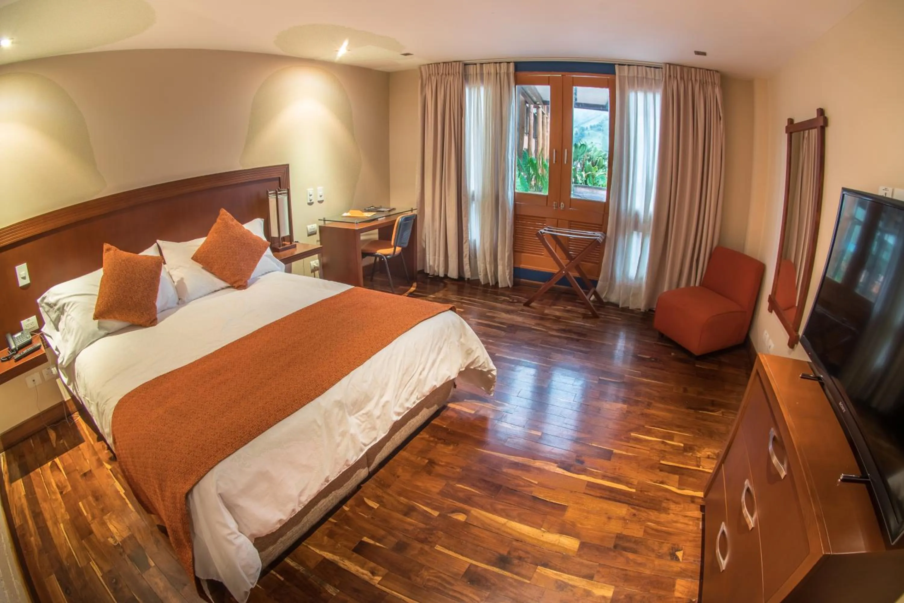 Photo of the whole room, Bed in Termales El Otoño