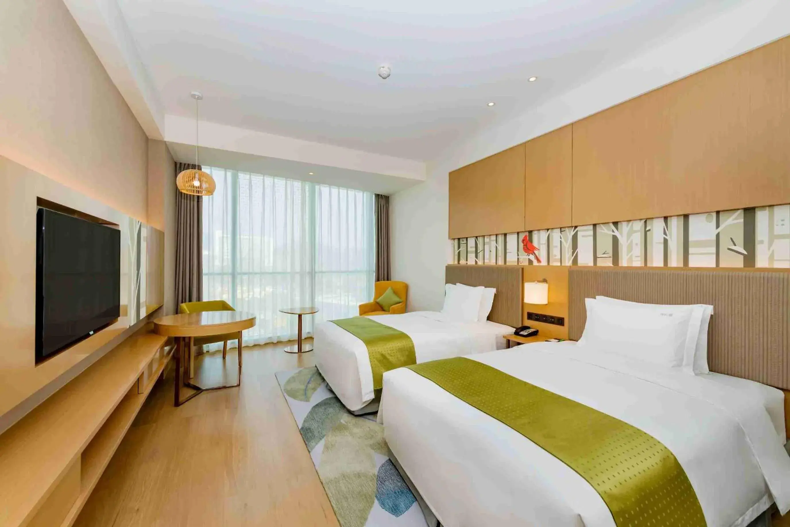 Bed in Holiday Inn Changsha Dawangshan by IHG Bed in Holiday Inn Changsha Dawangshan by IHG